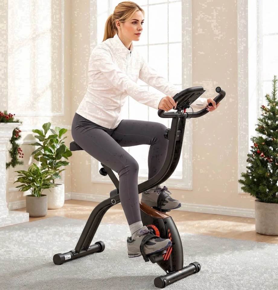 Naipo Exercise Bike Indoor 16 Level Magnetic Resistance Folding Stationary Bike with 265lbs Capacity Adjustable Seat Height Orange Color for Space Saving Home Use