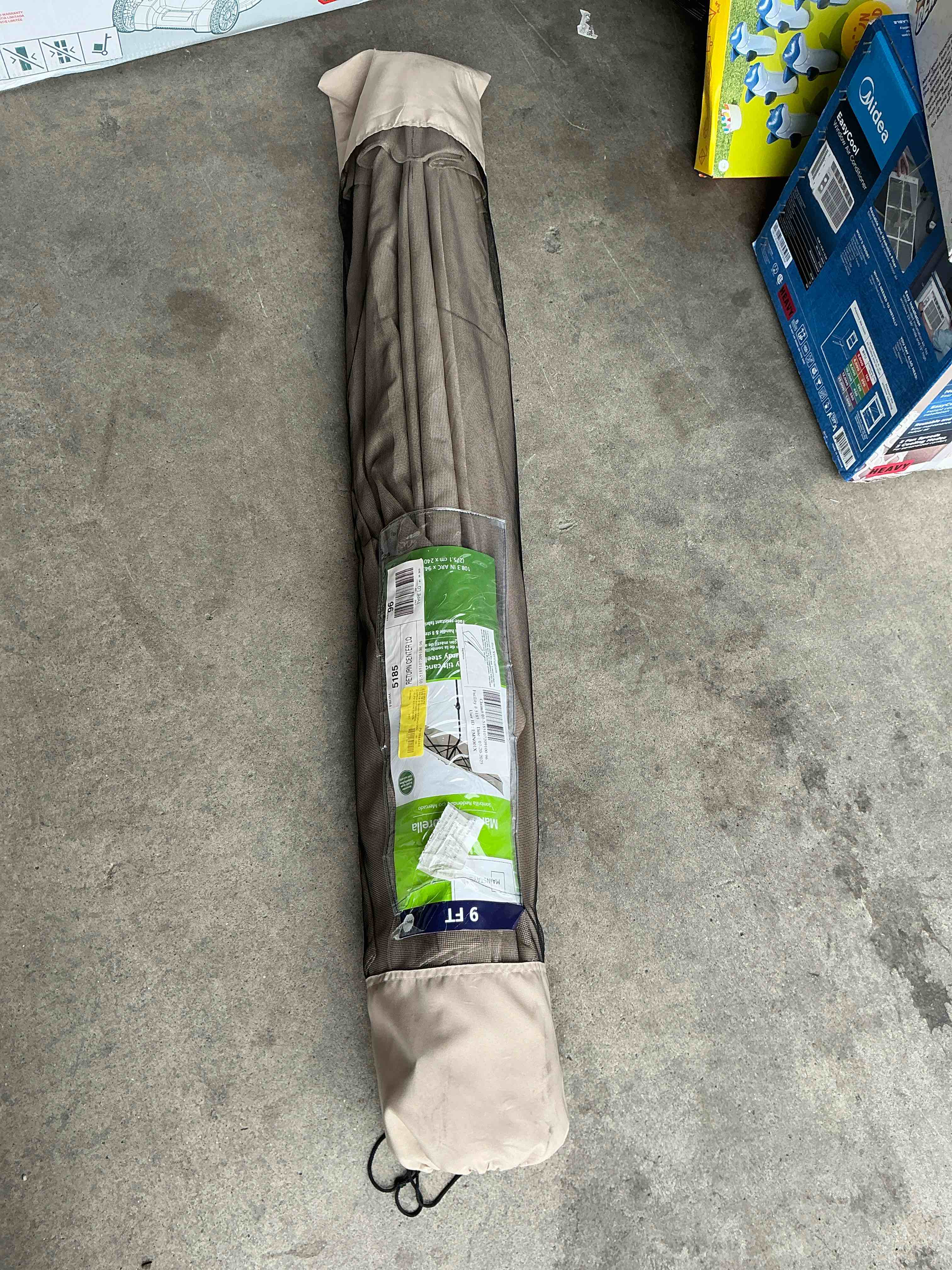 Condition photo showing Good Condition for sunnyglade 9' patio umbrella outdoor table umbrella with 8 sturdy ribs beige 