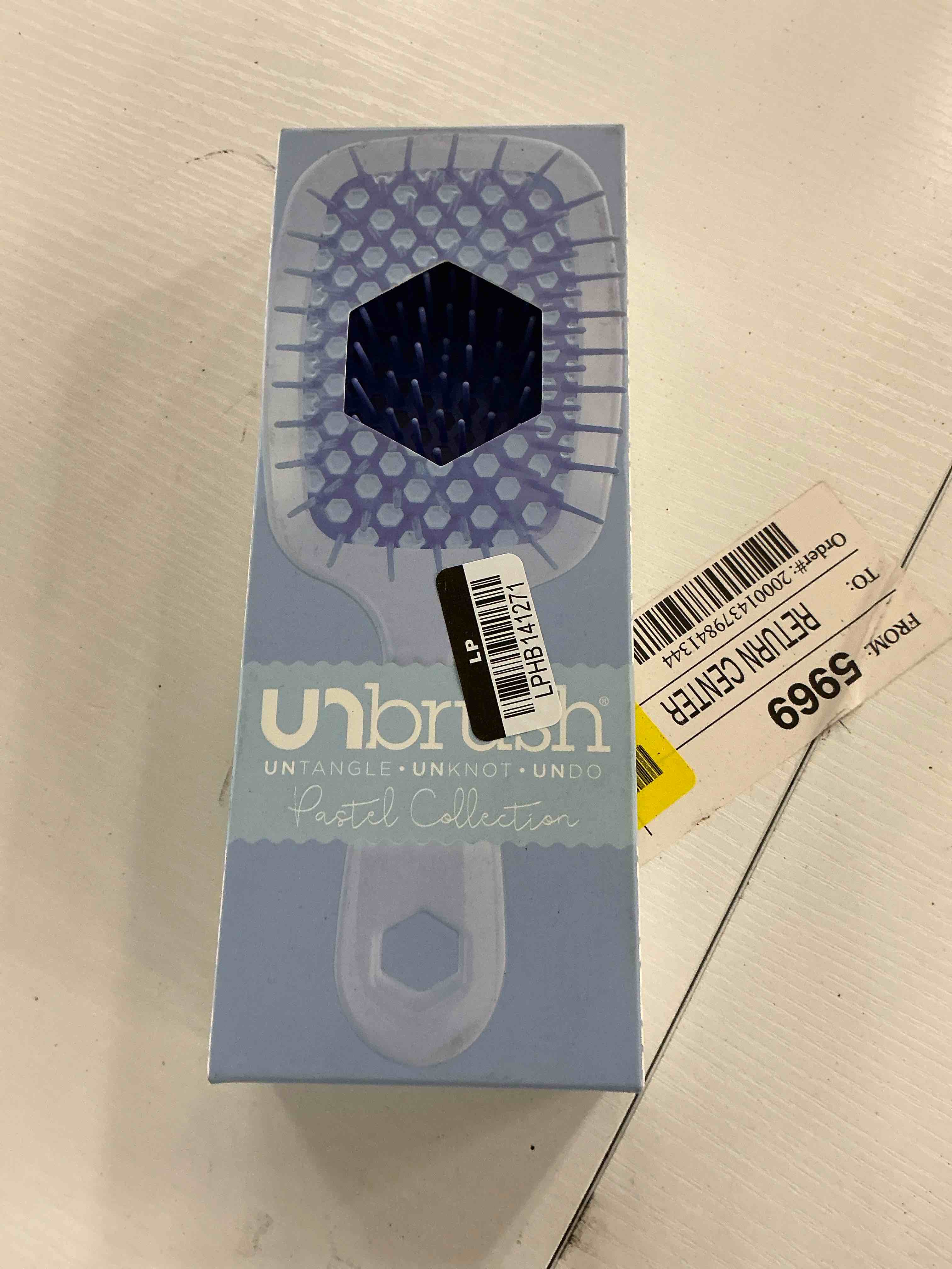 Condition photo showing New/Like New for unbrush detangler hair brush - periwinkle light blue: hair styling for all hair types, solid pattern