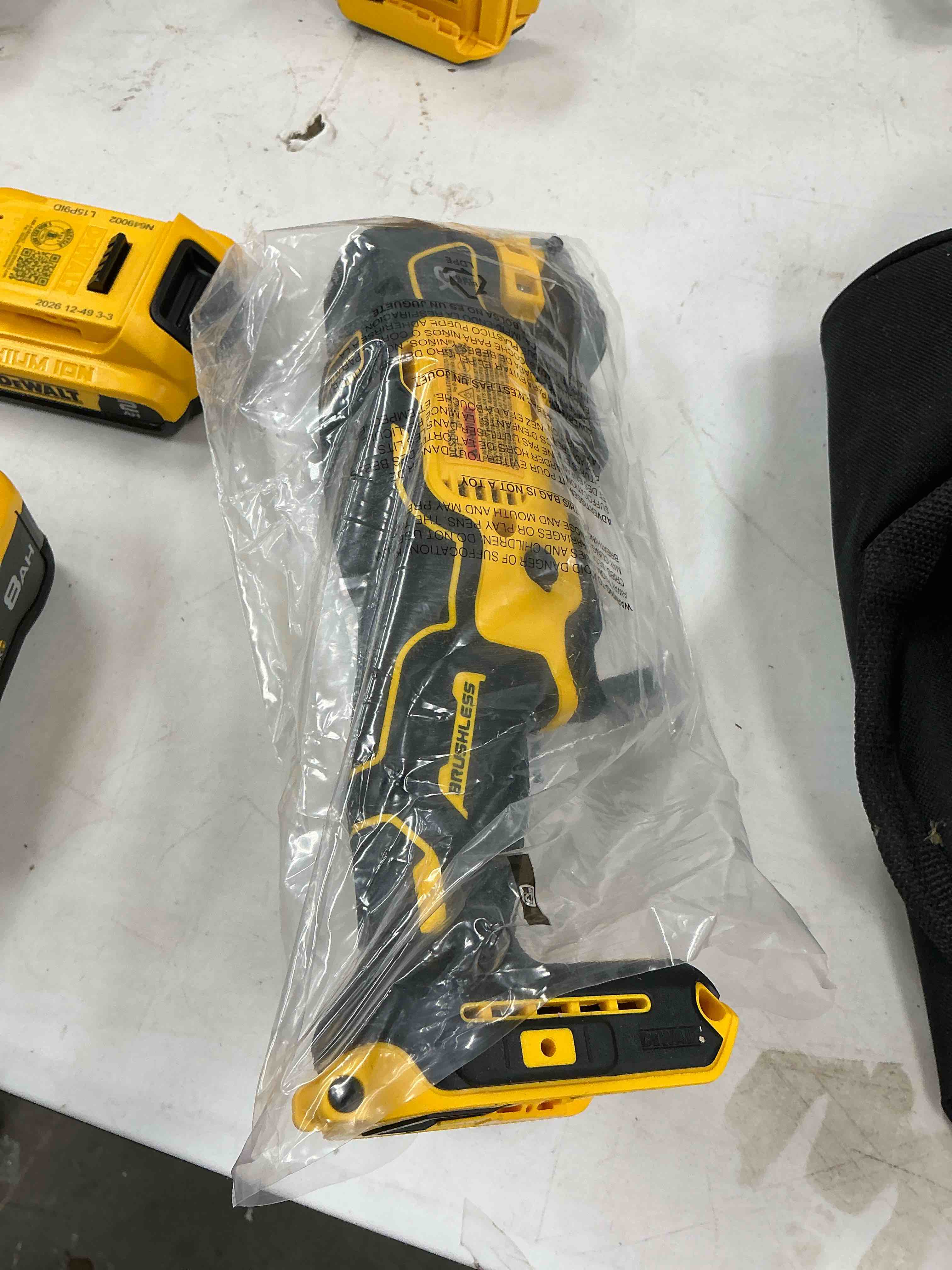 Condition photo showing Good Condition for dewalt 20-volt max cordless brushless 3-speed 4 -piece oscillating multi-tool-tool only