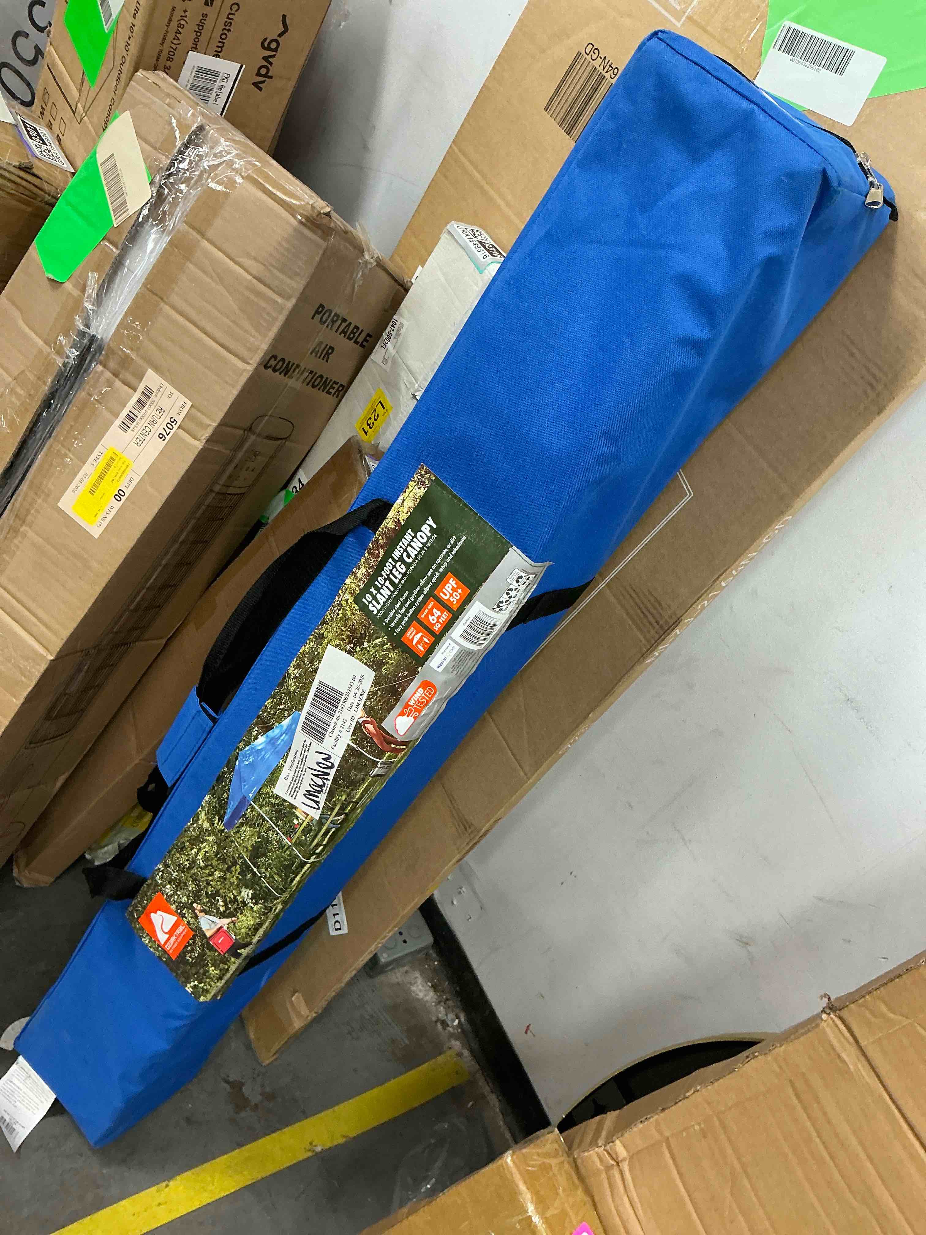 Condition photo showing New/Like New for ozark trail 10 x 10 instant slant leg pop-up outdoor canopy blue