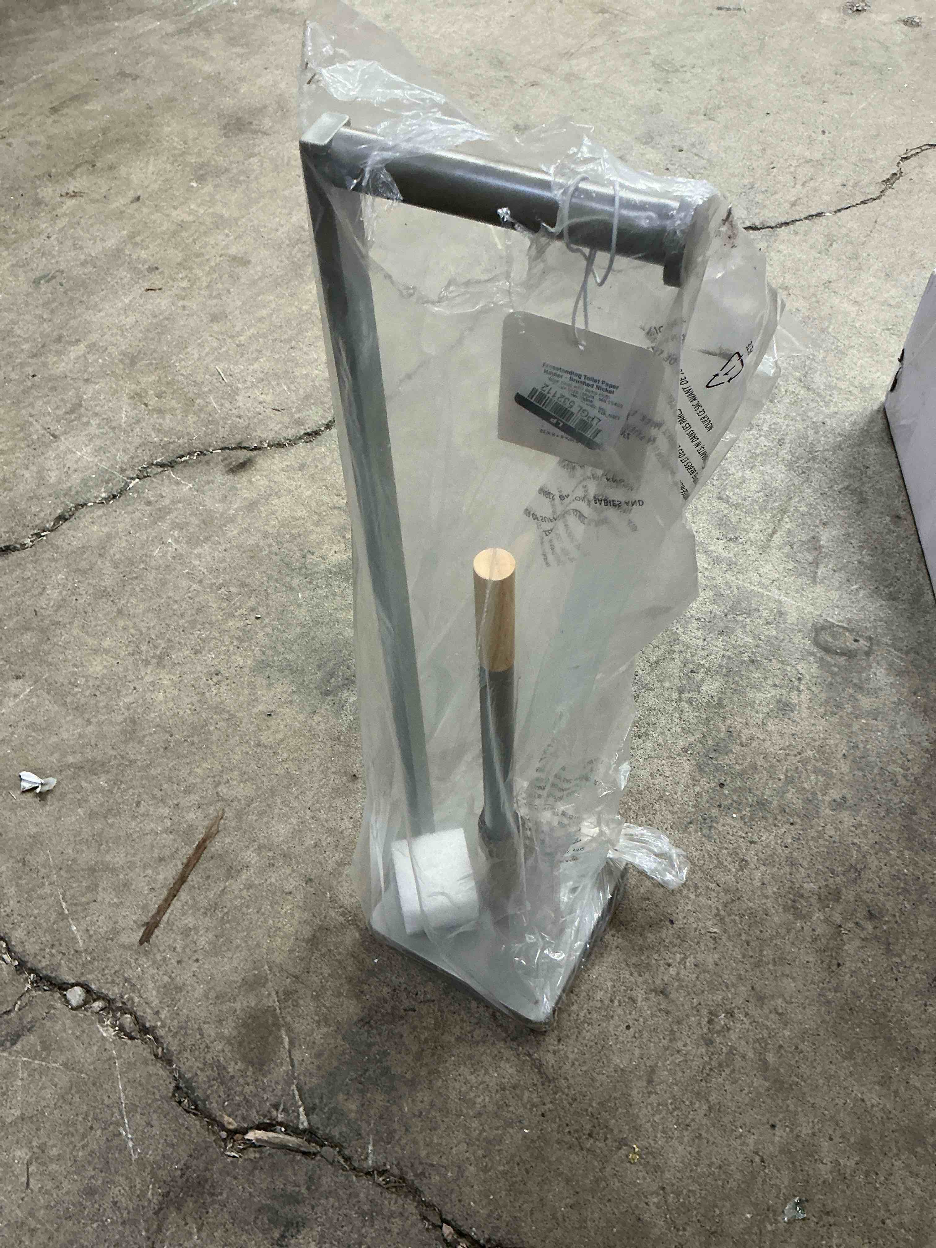 Condition photo showing New/Like New for premium freestanding toilet paper holder in matte gray with bamboo accent