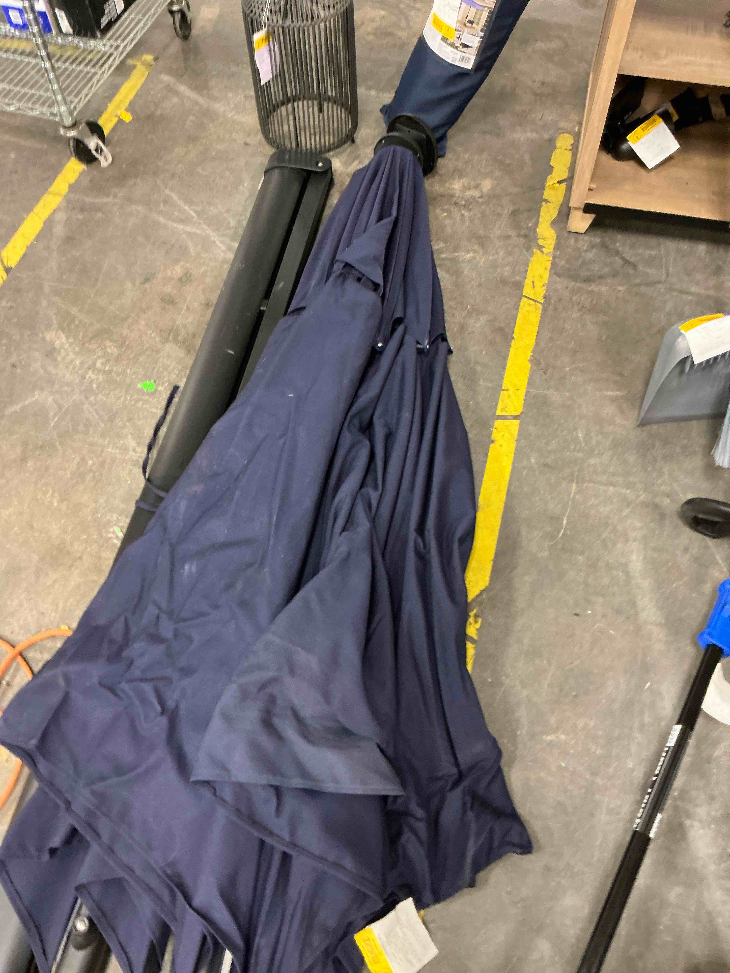 Condition photo showing As Is for allen + roth 11-ft aluminum navy slide-tilt cantilever patio umbrella 