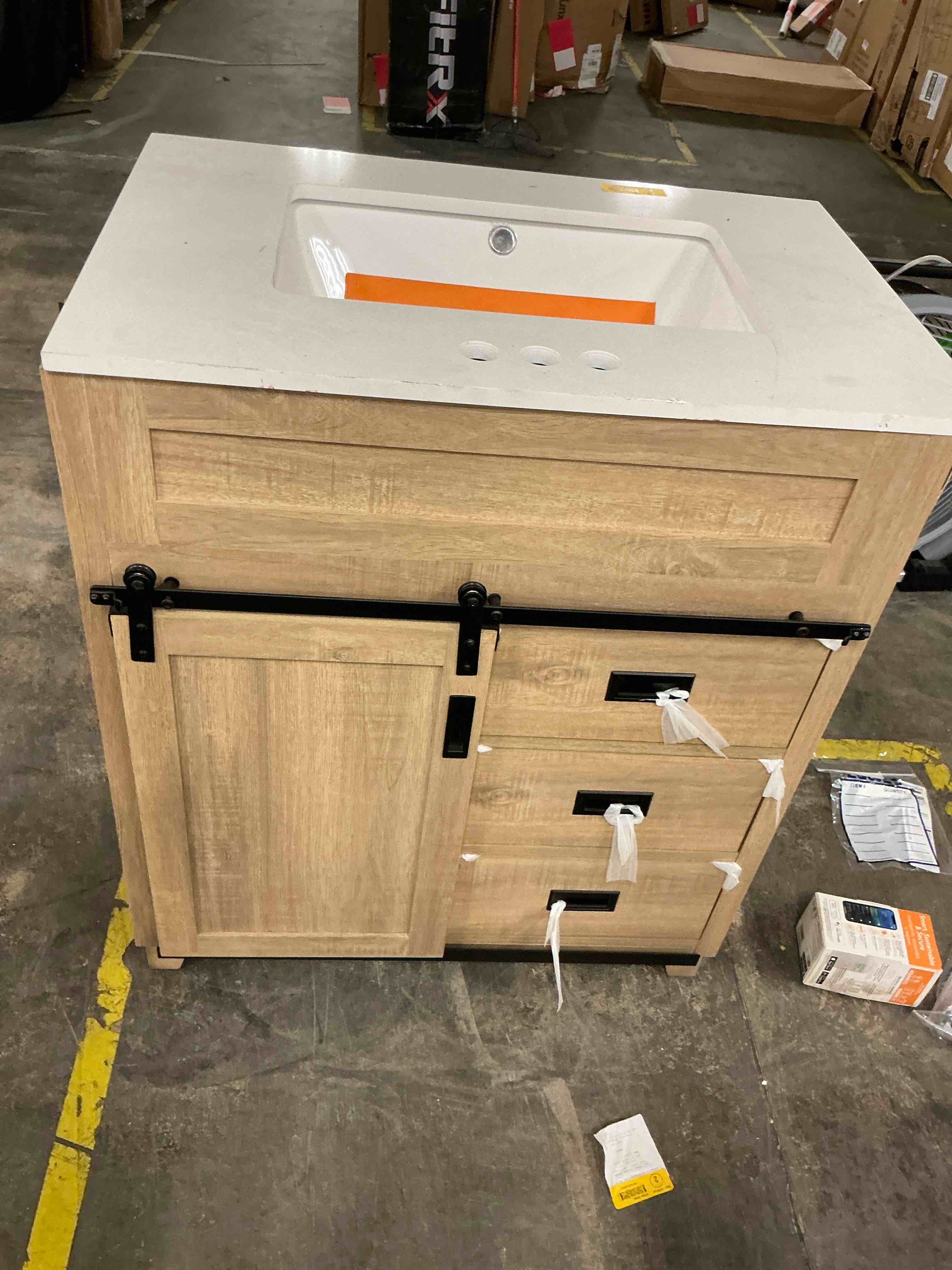 Condition photo showing As Is for style selections morriston 24-in light natural oak undermount single sink bathroom vanity (assembled)