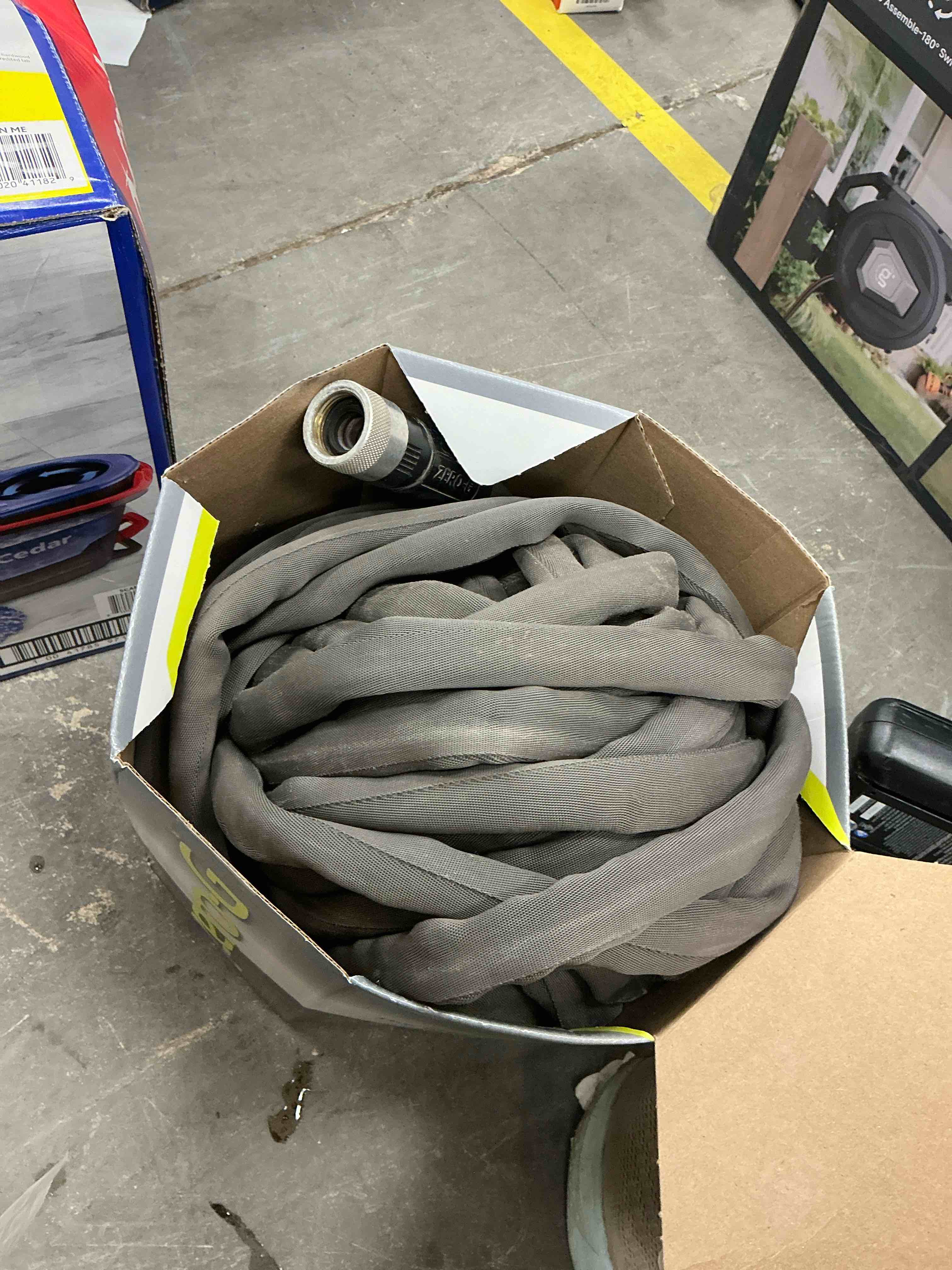 Condition photo showing As Is for zero-g teknor apex 5/8-in x 100-ft premium -duty kink free woven gray hose