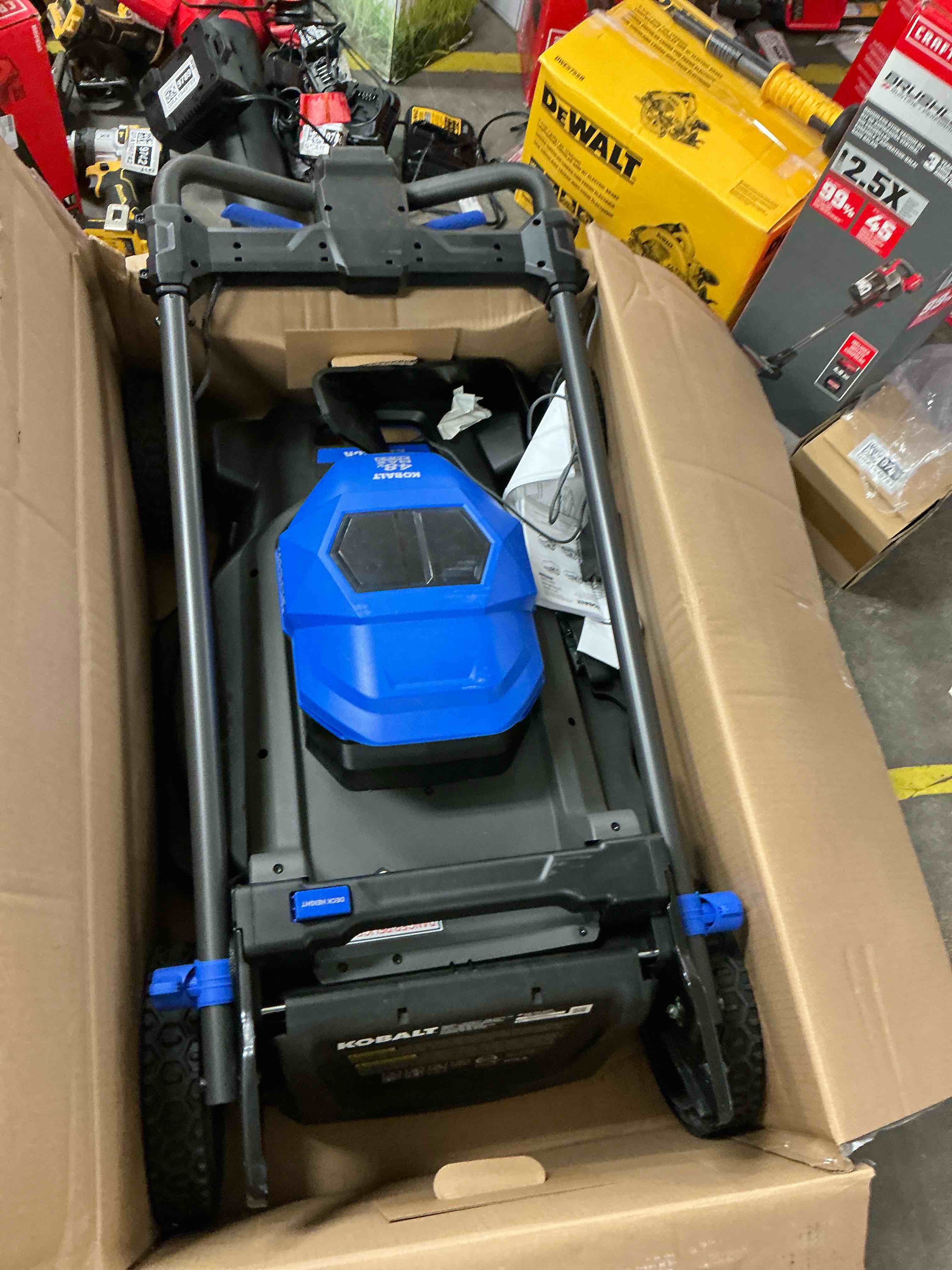 Condition photo showing Good Condition for kobalt 48v max (24vx2) 21-in push mower kit, (2) 5.0ah batteries and charger included