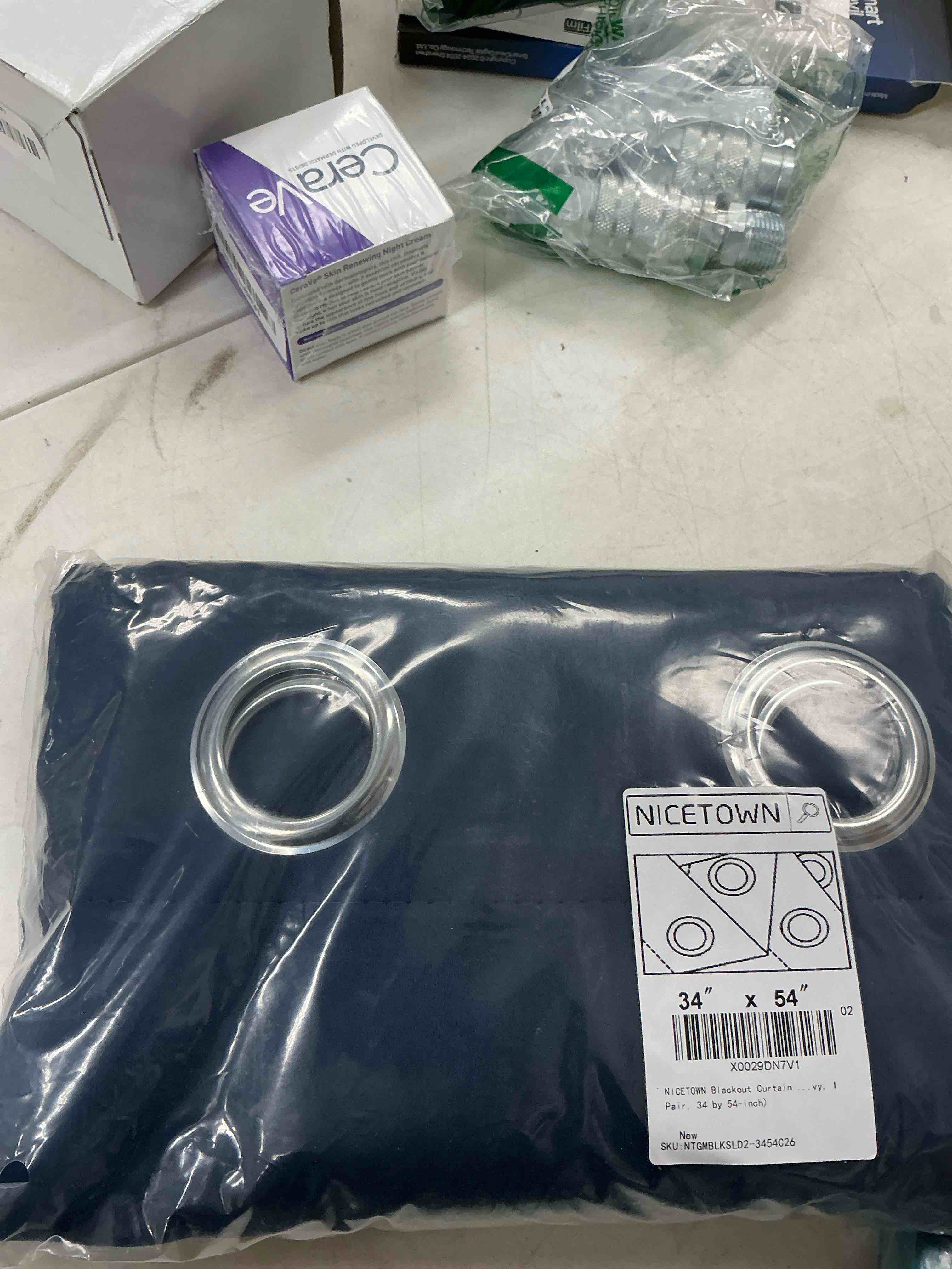 Condition photo showing New/Like New for NICETOWN Blackout Curtain Panels, Window Treatment Energy Saving Thermal Insulated Solid Grommet Blackout Drapes/Draperies (Navy, 1 Pair, 34 by 54-inch) Navy 34"W x 54"L (Pack of 2)