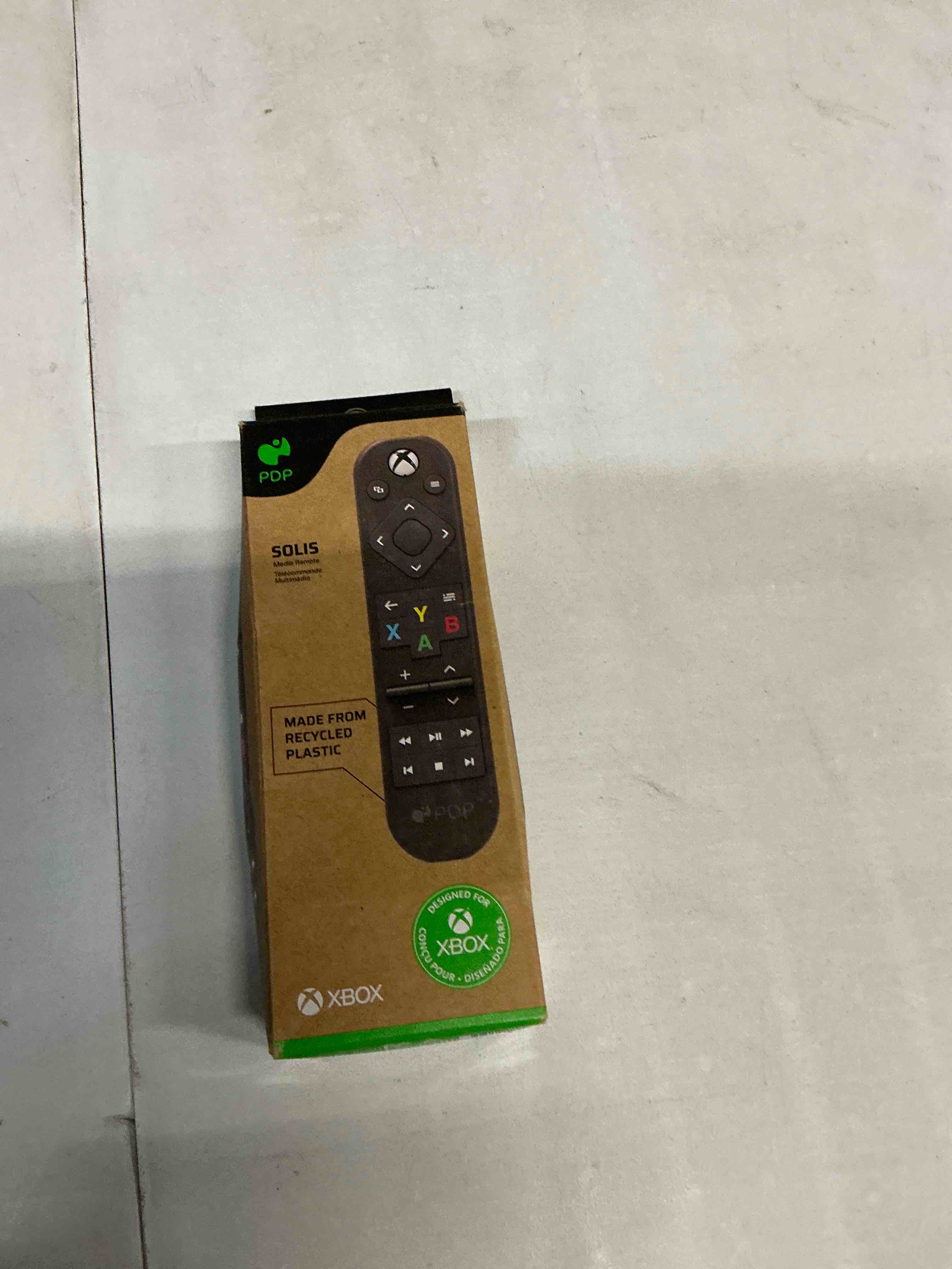 Condition photo showing Good Condition for pdp solis xbox gaming media remote control for tv - fully licensed by microsoft for xbox series x|s, xbox one, solar powered rechargeable battery, compact navigation toggle, black solis media remote