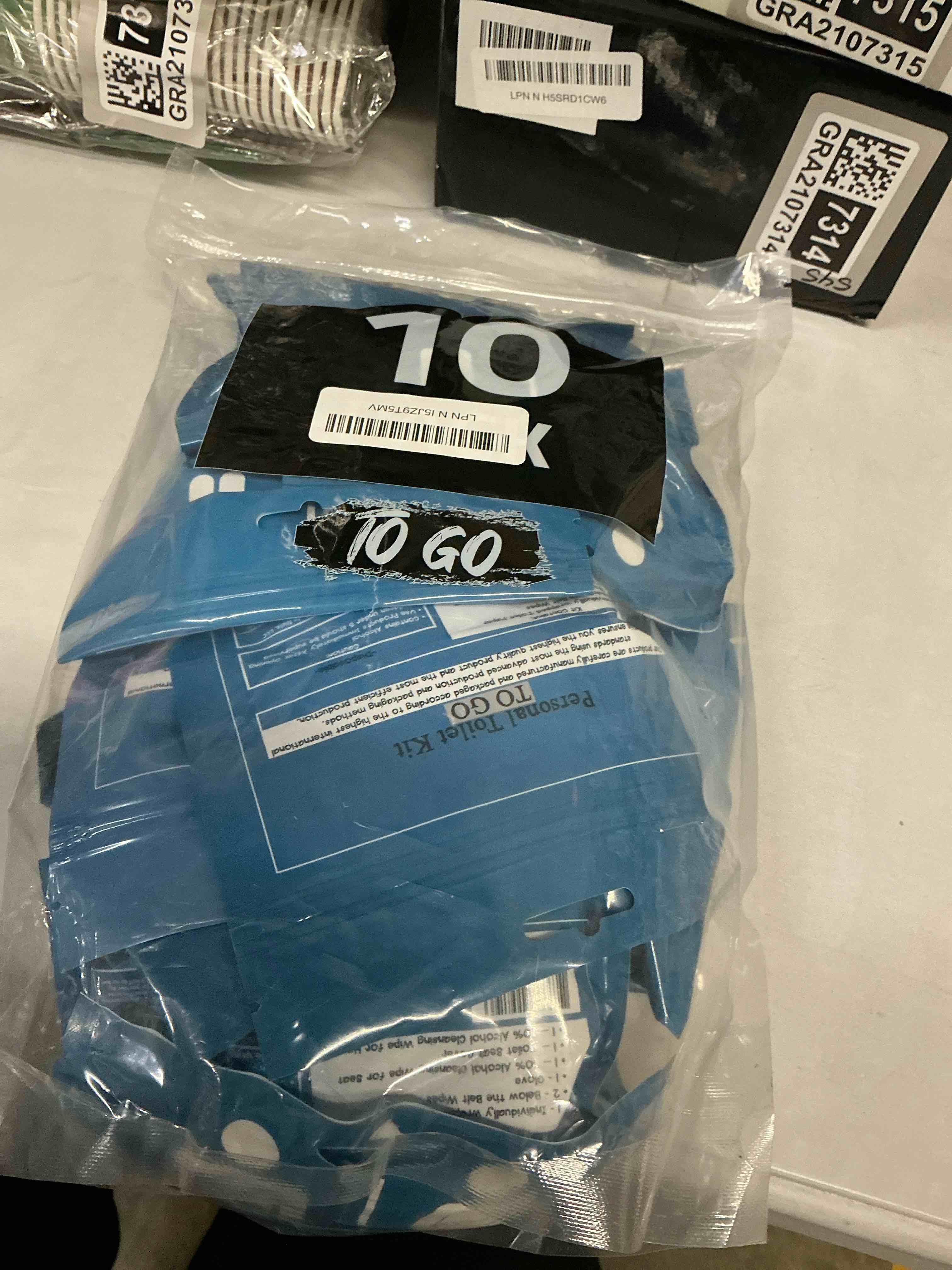 Condition photo showing Good Condition for personal toilet kit to go – 10 pack | disposable public restroom kit | individually wrapped for toilet protection kit | toilet paper, toilet seat cover, butt wipes, cleansing wipes (light blue)