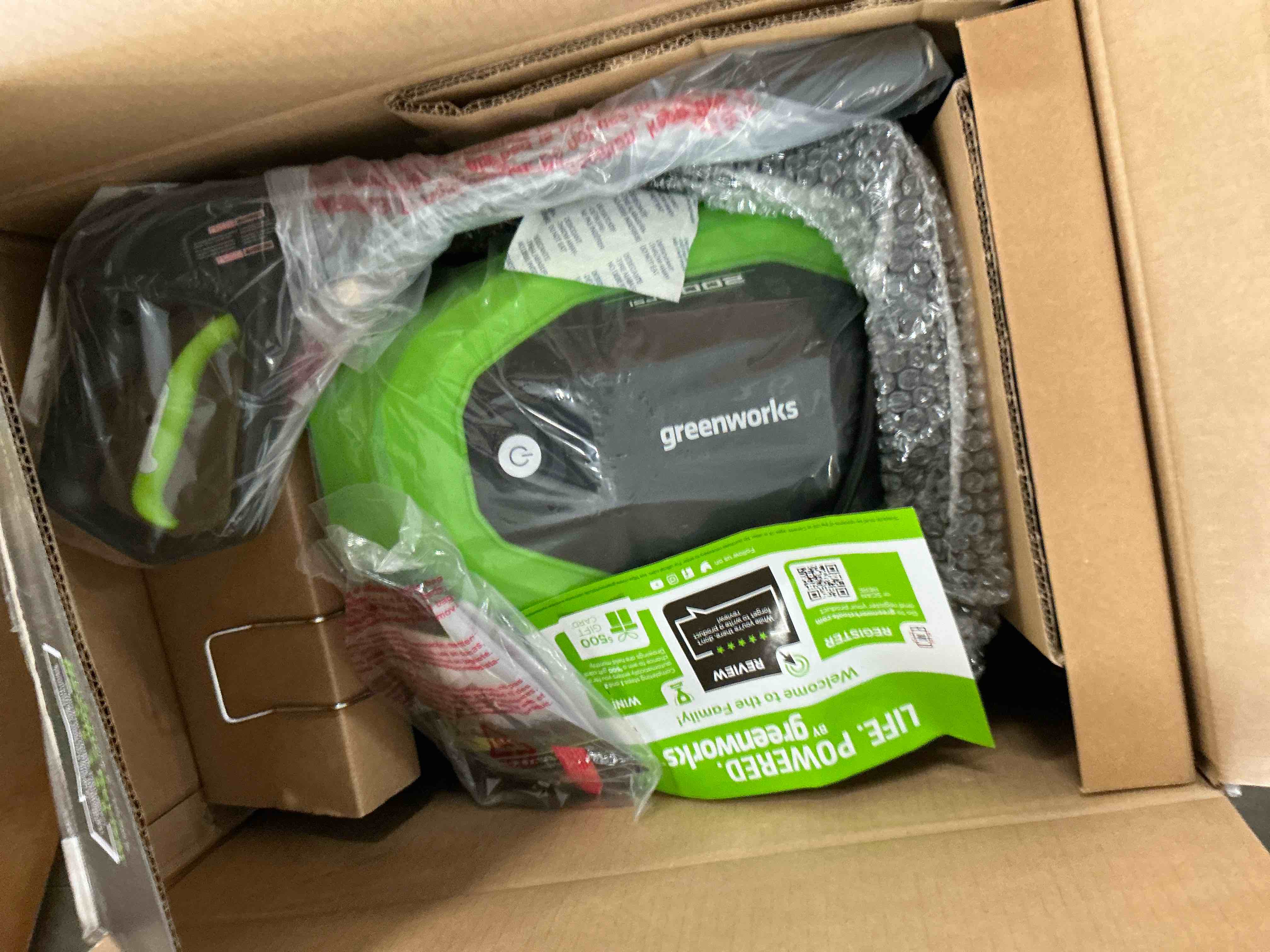 Condition photo showing New/Like New for Greenworks 2000 PSI at 1.2 GPM Pressure Washer