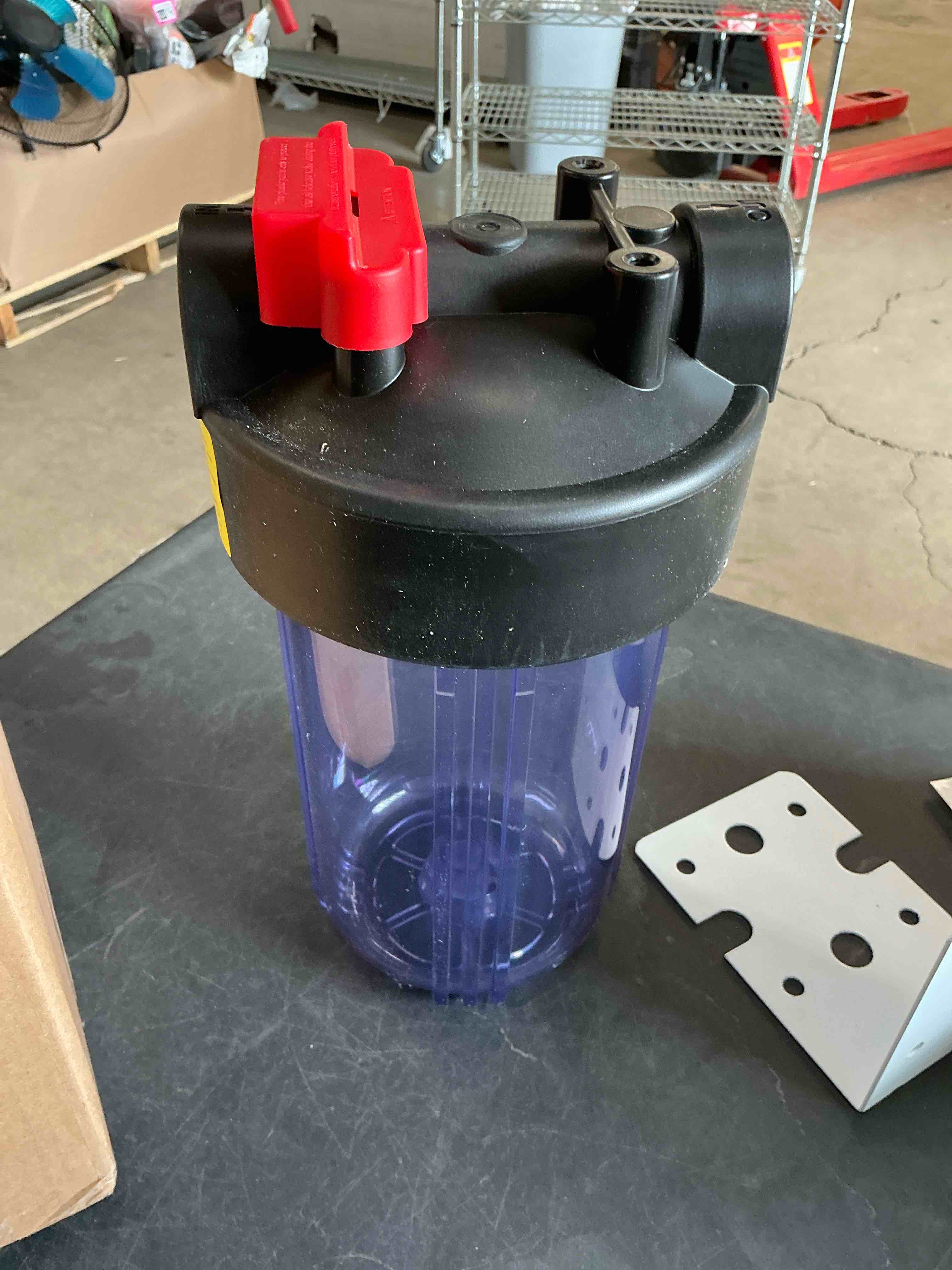 Condition photo showing Good Condition for pureplus whole house water filter housing, 10"x4.5" universal housing, pre-filtration system, with pressure gauge, 1" npt universal housing-clear