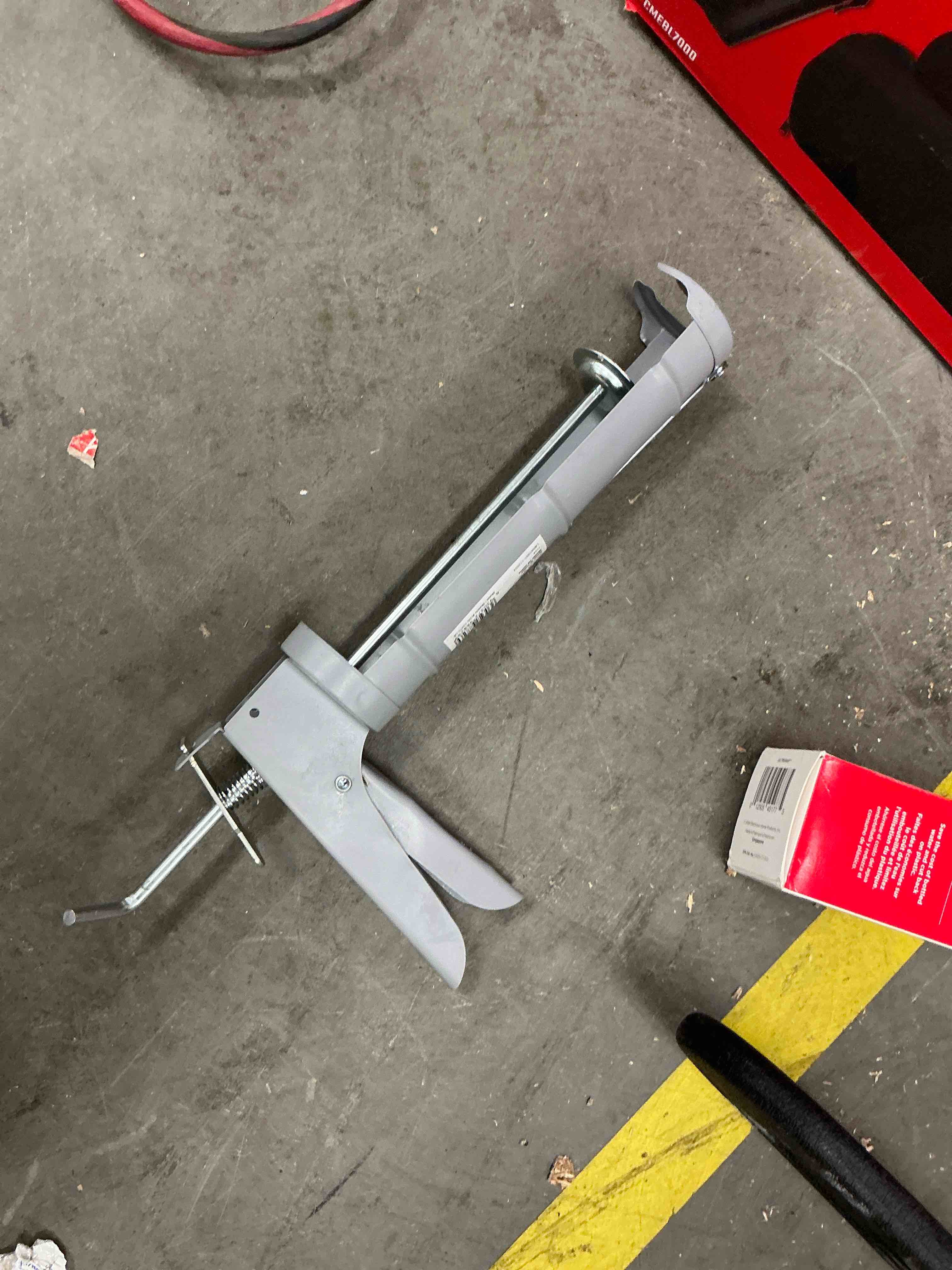 Condition photo showing As Is for project source 10 -oz smooth rod caulk gun