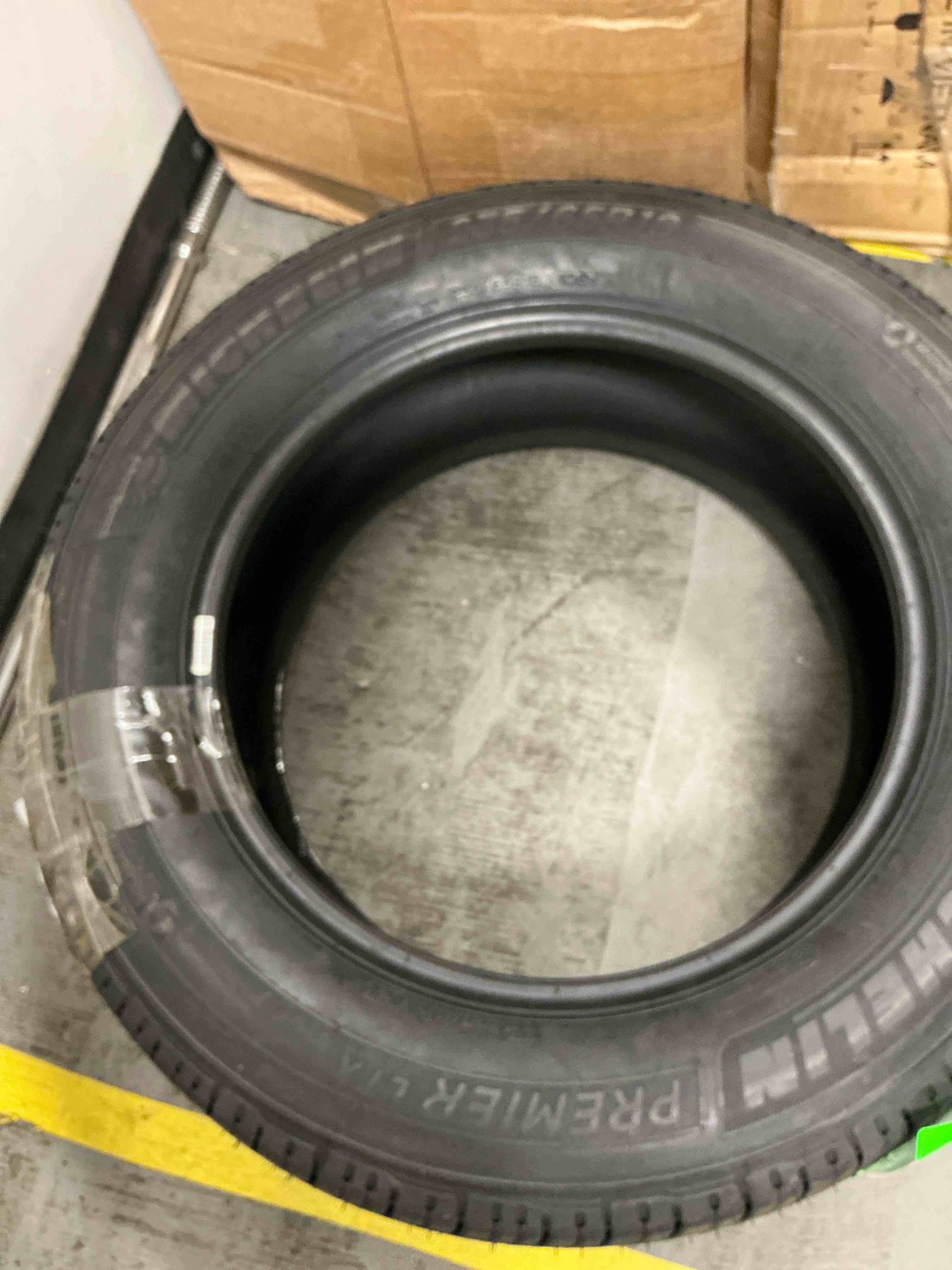 Condition photo showing New/Like New for michelin premier ltx all-season 235/65r18 106v tire