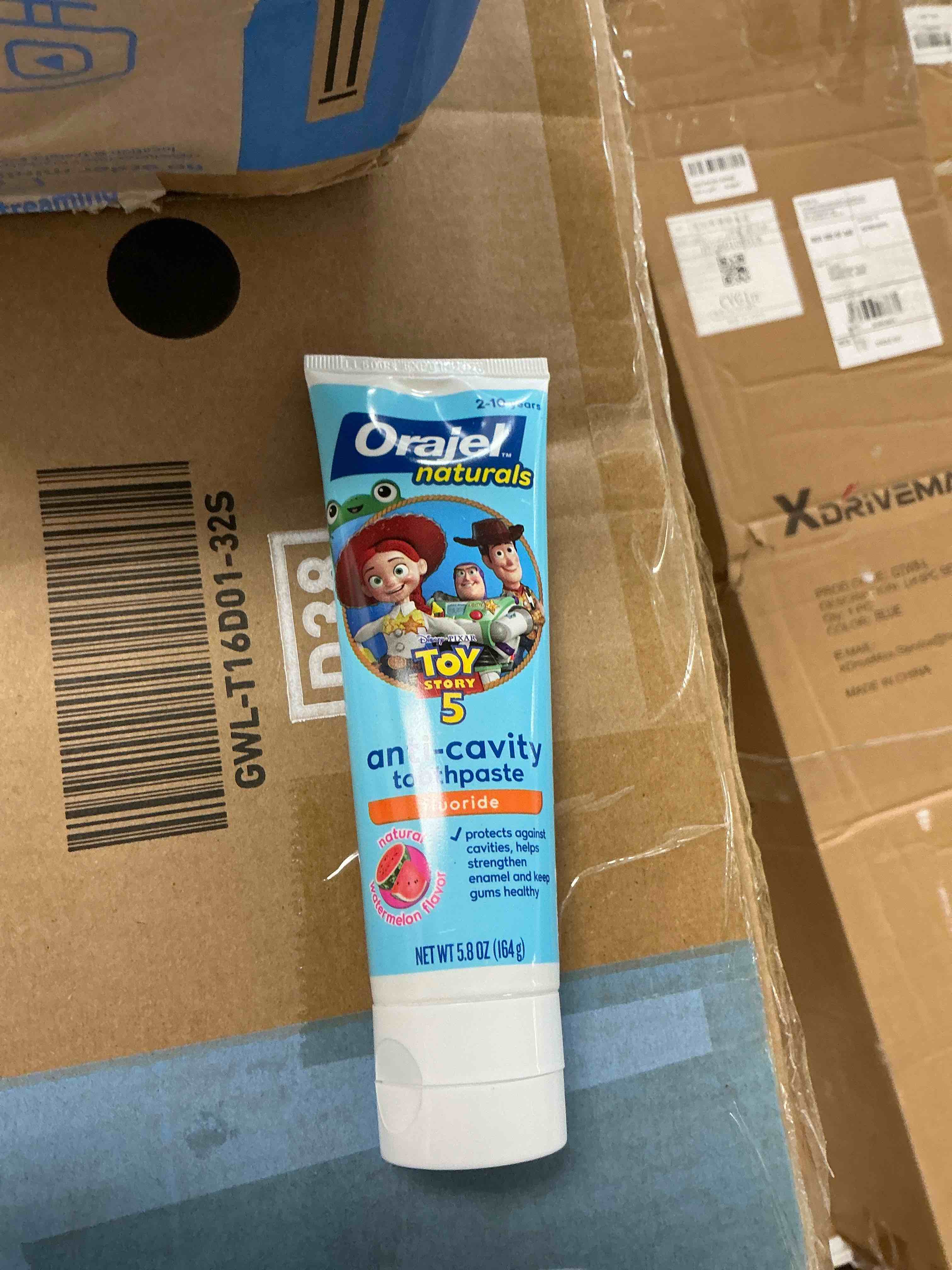 Condition photo showing New/Like New for orajel naturals toy story 5 anti-cavity fluoride toothpaste  natural watermelon flavor  5.8 oz