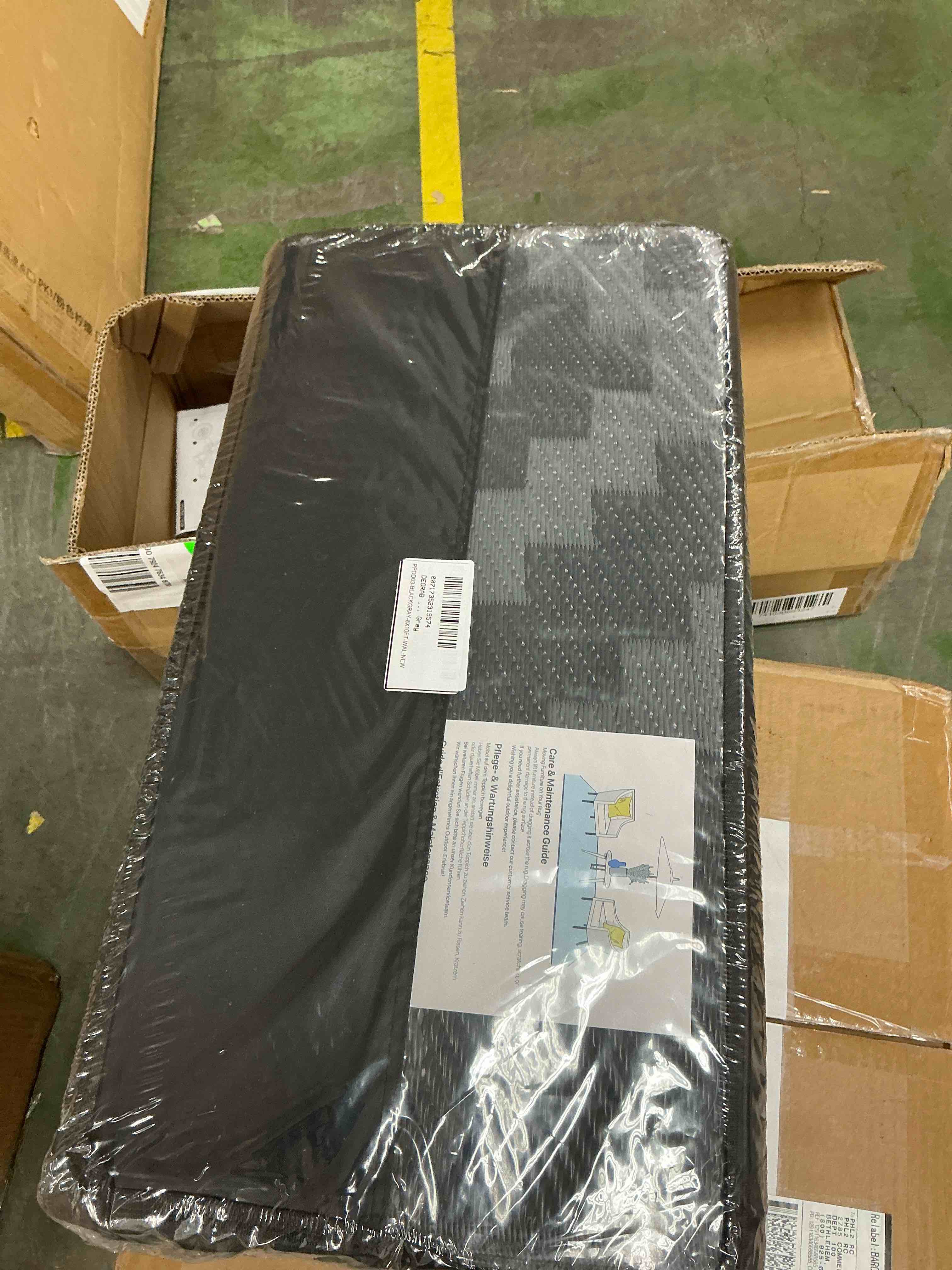 Condition photo showing New/Like New for deorab outdoor rugs waterproof plastic straw mat 8'x10' reversible for rv patio deck beach black & gray