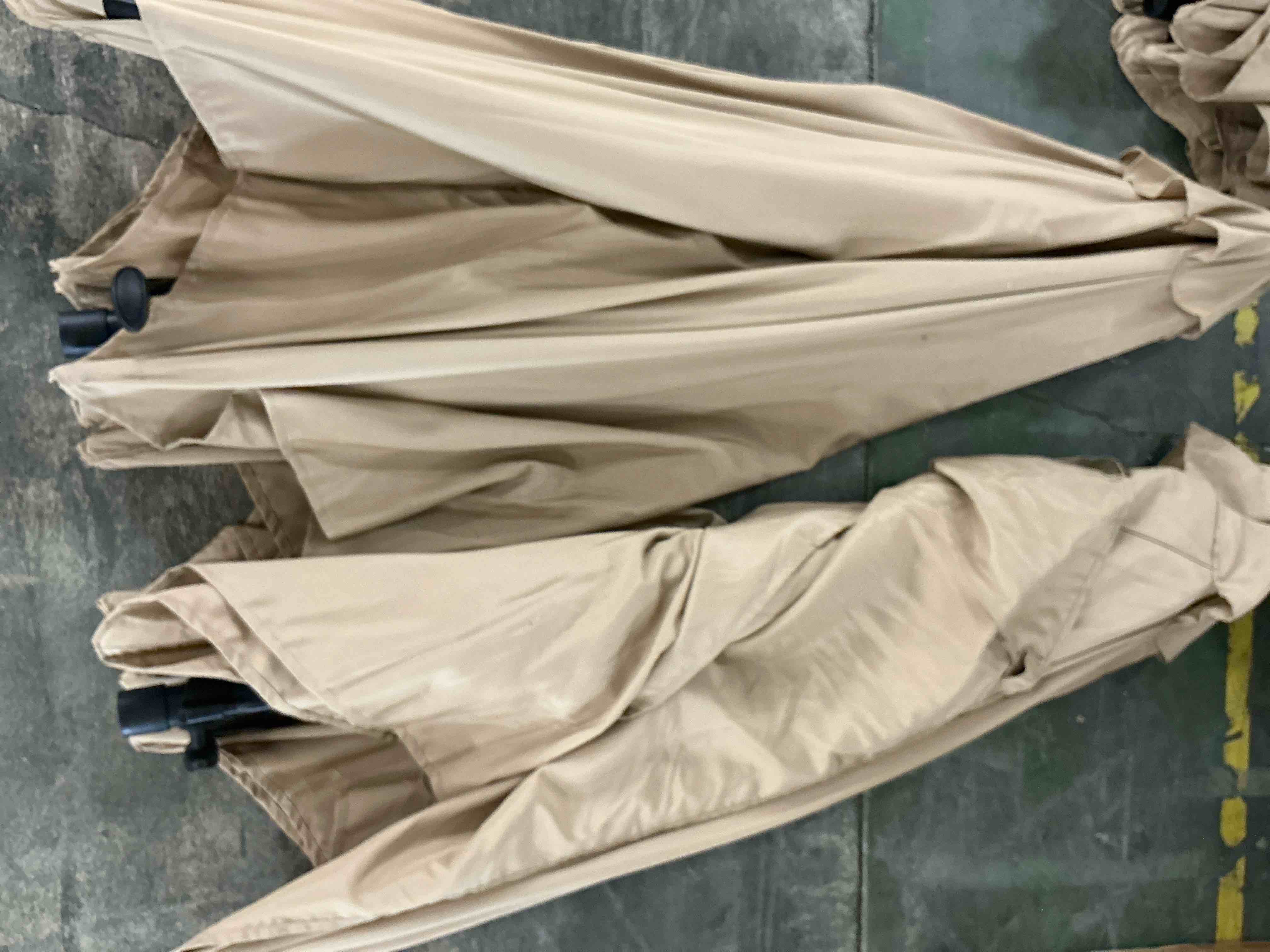 Condition photo showing As Is for 2 abccanopy 9ft outdoor market hand push patio umbrella khaki