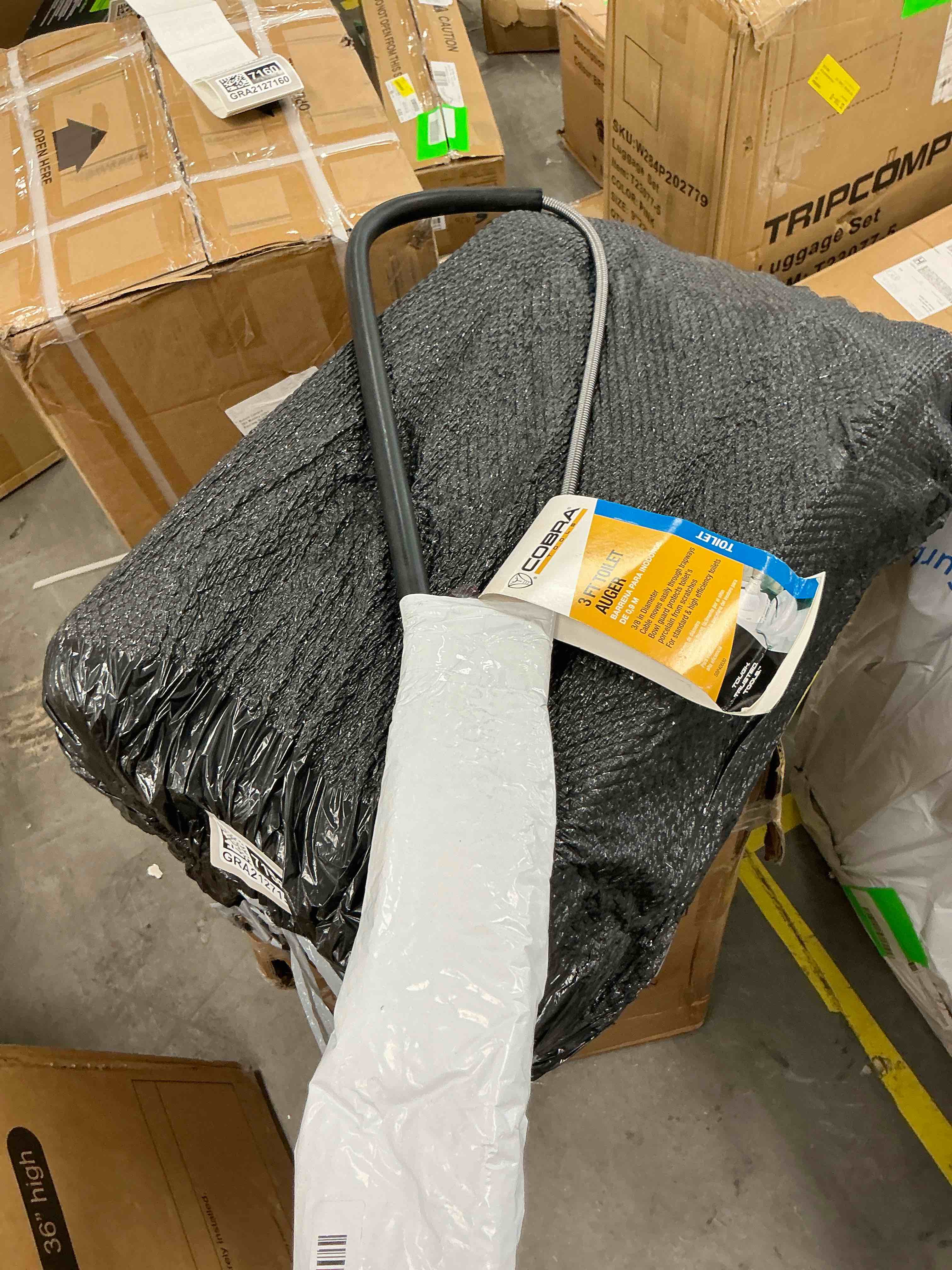 Condition photo showing Good Condition for peerless homeowner toiler auger which features a rust-resistant spring wire and a non-slip grip handle.