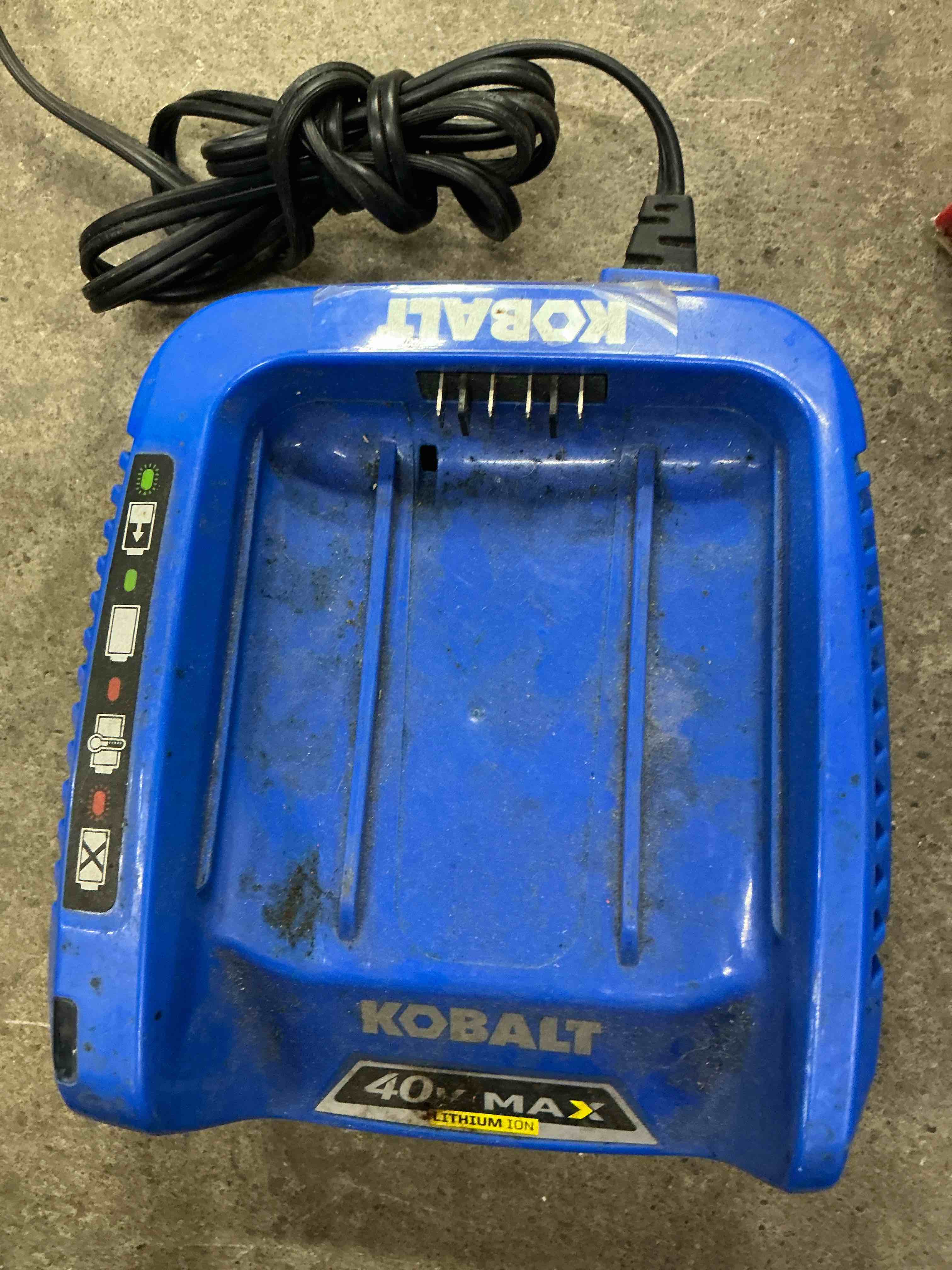 Condition photo showing As Is for kobalt krc 60-06 40v max lithium ion battery charger only tested oem