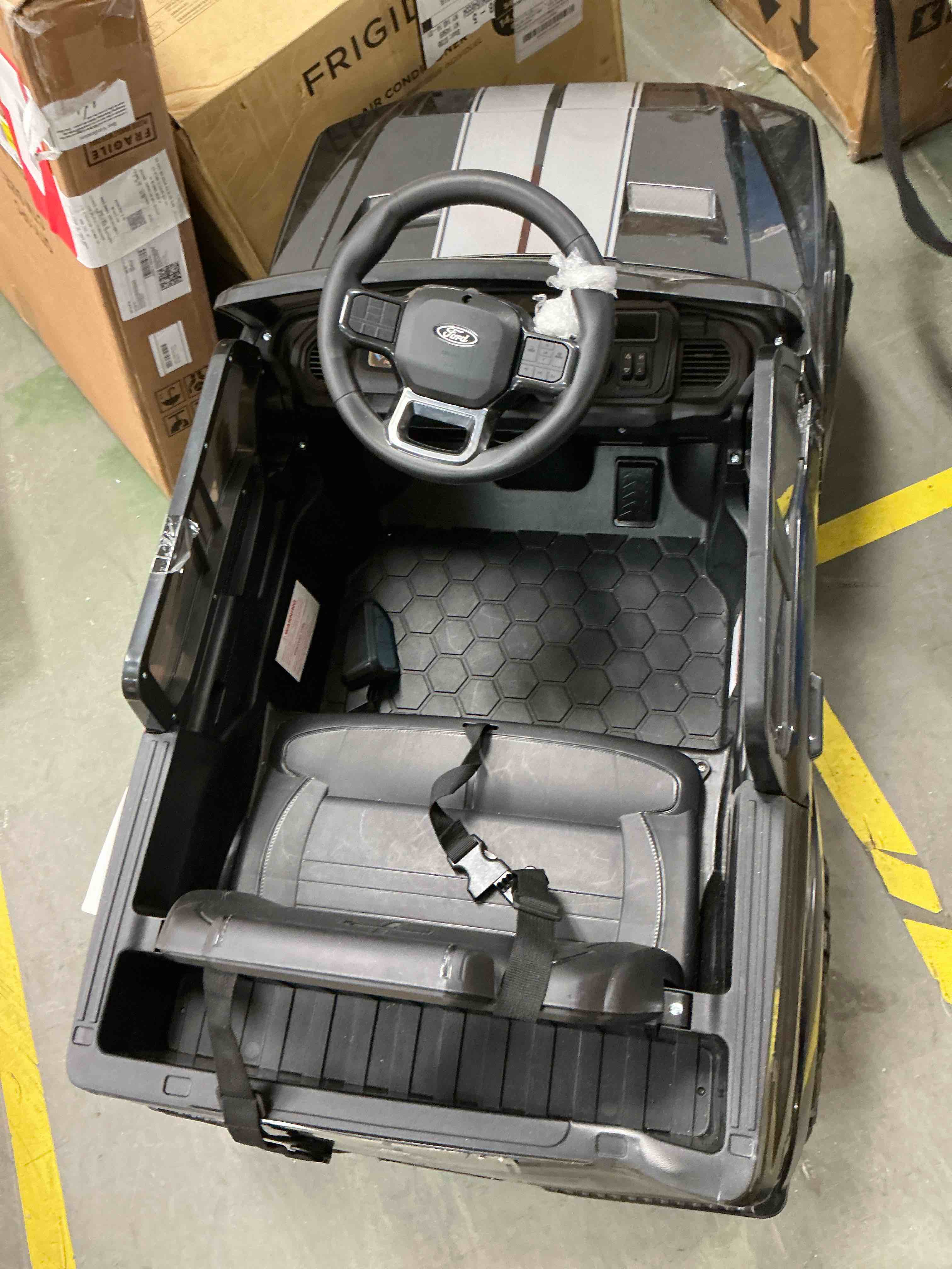 Condition photo showing Good Condition for hikiddo electric car for kids, licensed ford-shelby f-150 12v ride on truck toys for toddlers w/ remote, 2-hour drive time - black