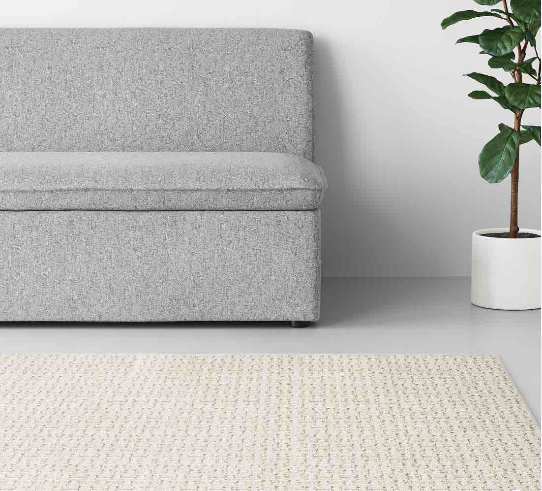 4'x5'6" washable solid machine tufted accent rug tan - threshold™: skid-resistant low pile indoor carpet
