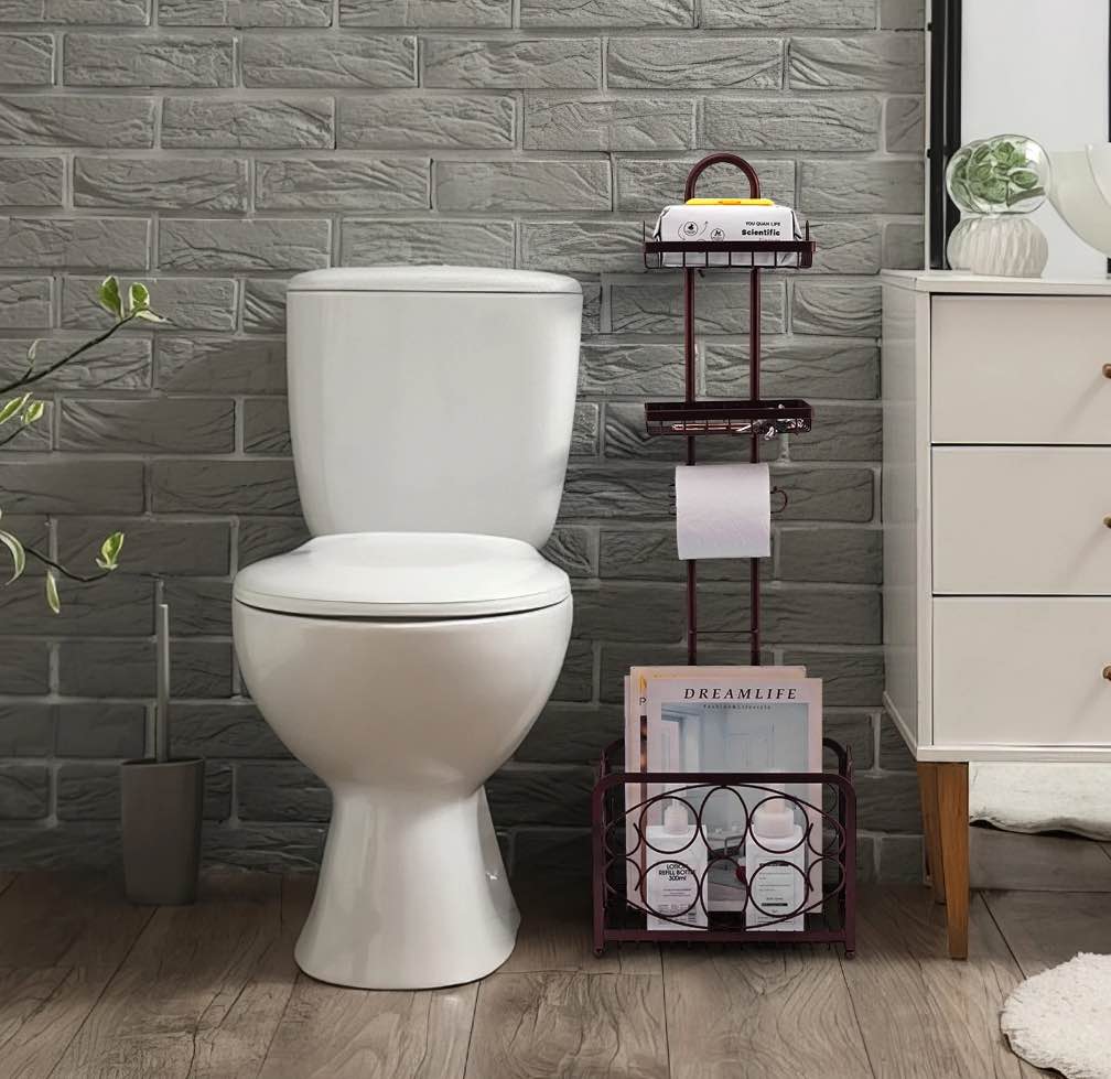 Oasis Creations Toilet Paper Holder Tissue Rack Stand with Magazine Toilet Roll Storage Basket- Freestanding, Bronze Metal
