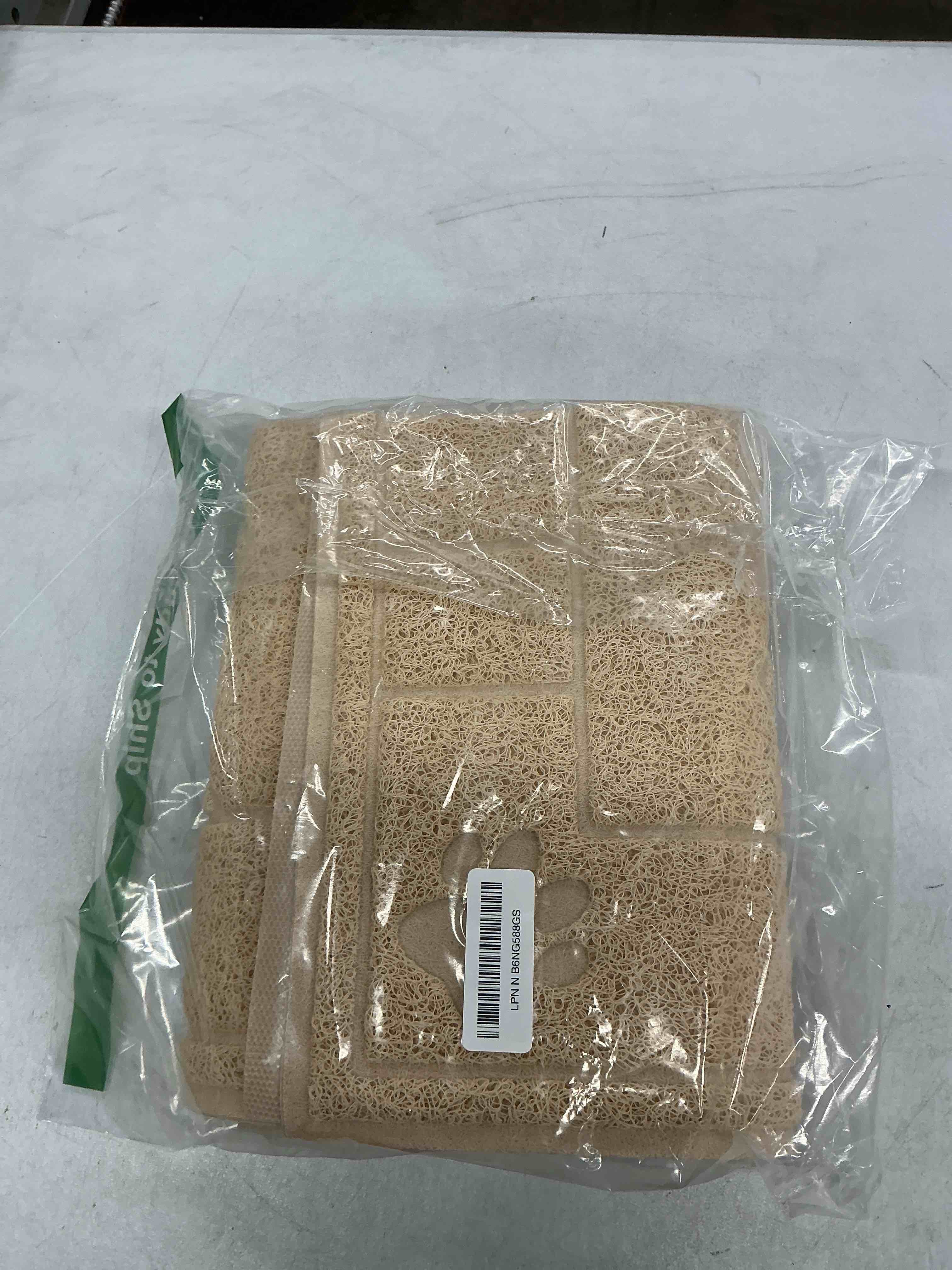 Condition photo showing Good Condition for cat litter mat, litter trapping mat soft on kitty paws, 35" x 24" kitten litter box mat for cleaner floors, waterproof, easy clean, durable large size cat litter pad for kitten. beige x-large?35" x 24" )