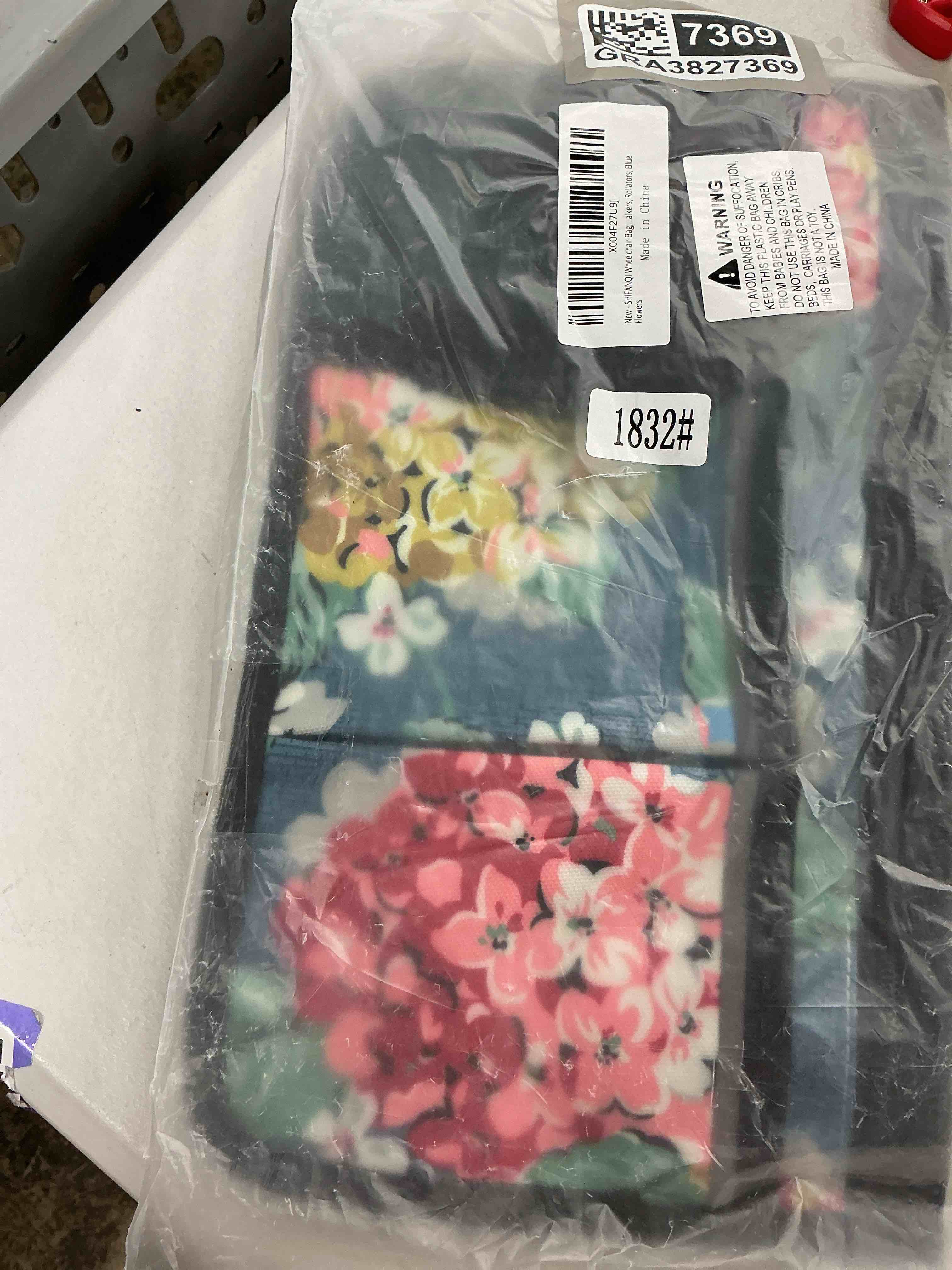 Condition photo showing Good Condition for wheelchair bag, walker bag, wheelchair side bag, armrest organizer pouch with cup holder attachment and reflective strip, accessories for most wheelchairs, walker, rollators, blue flowers blue-color flowers