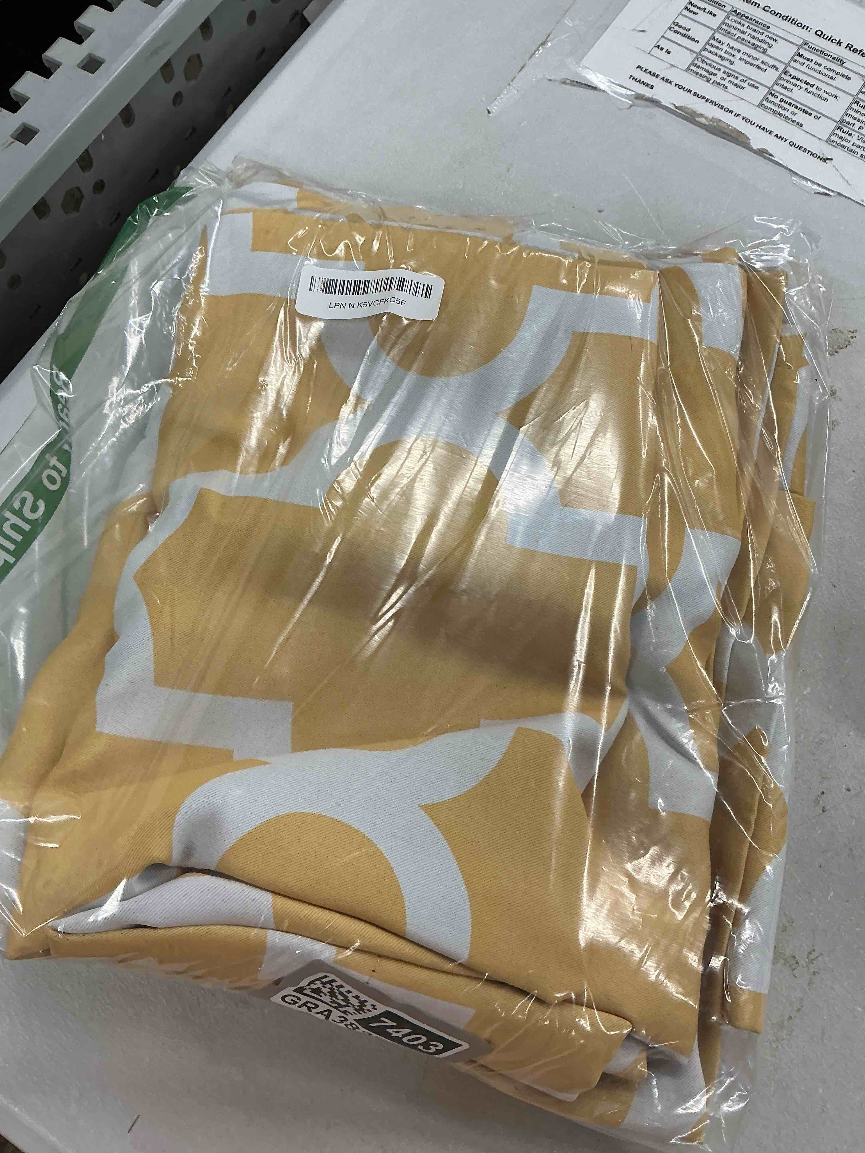 Condition photo showing Good Condition for town & country everyday ironwork geo trellis sateen indoor curtains, room darkening blackout, grommet top, energy efficient, 2-pack set, 52"x84", sundress yellow sundress yellow 52"w x 84"l (pack of 2)