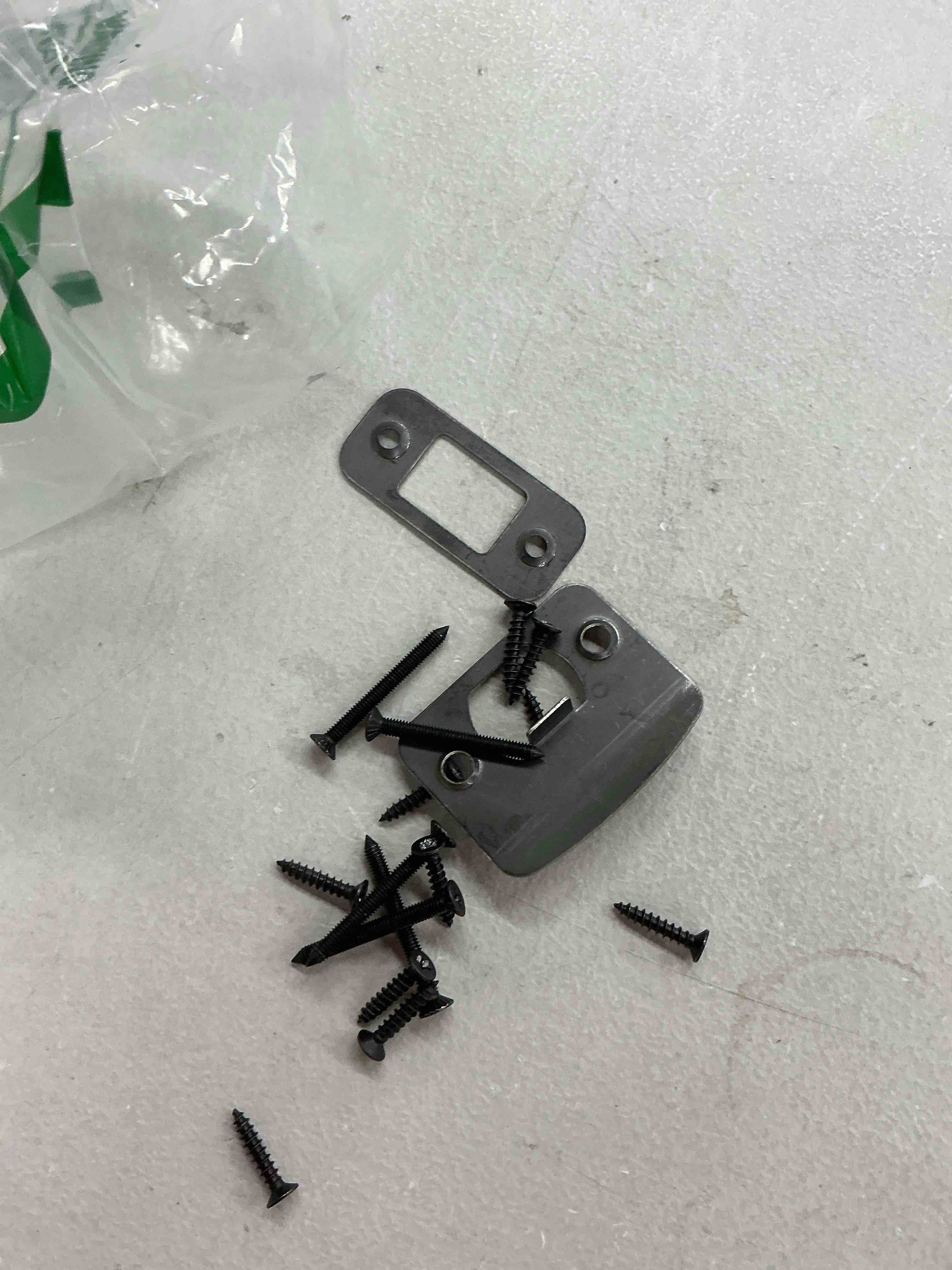Condition photo showing Good Condition for standard door strike plate with shim, door lock latch restorer spacer, universal residential security striker, fix door won’t latch close (black)