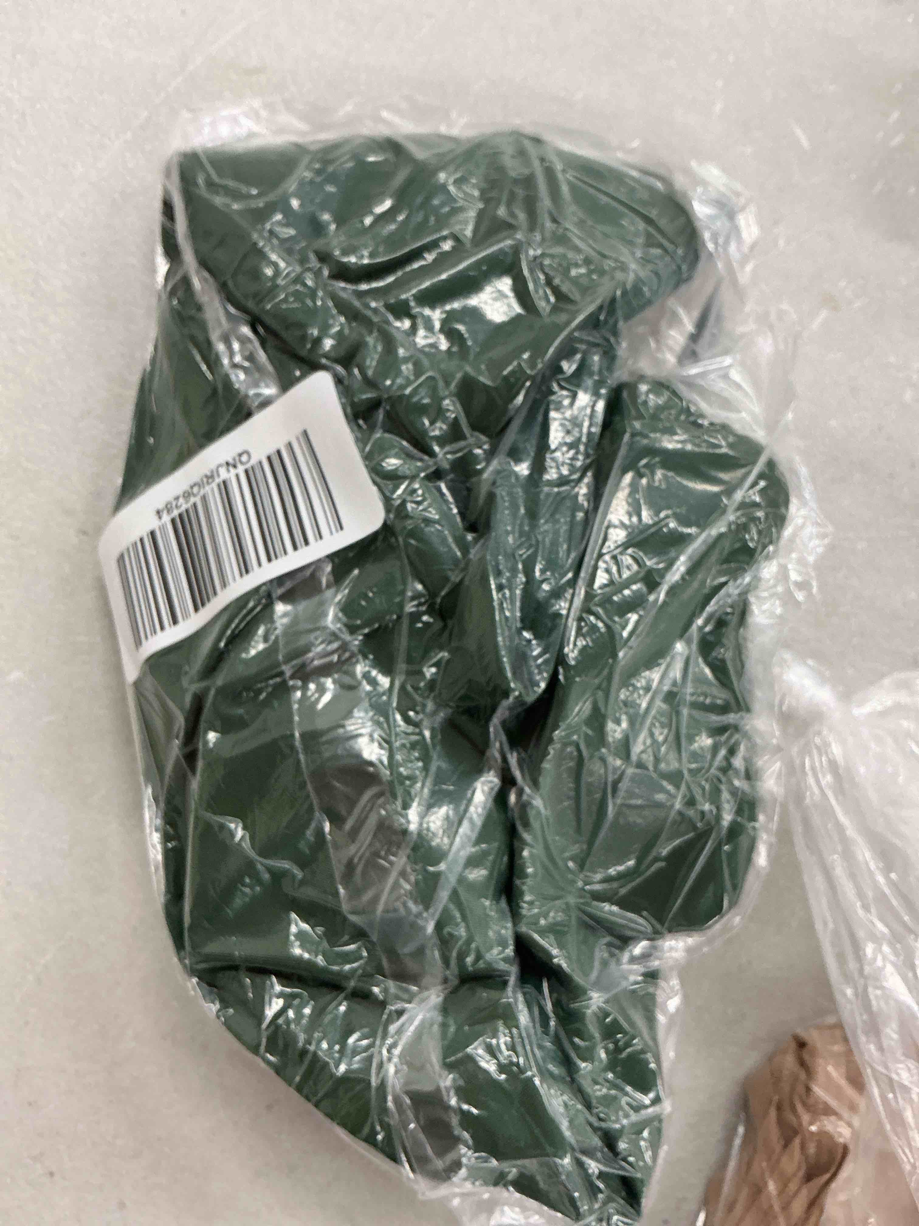 Condition photo showing New/Like New for italian plunge one-piece swimsuit, m, palm
