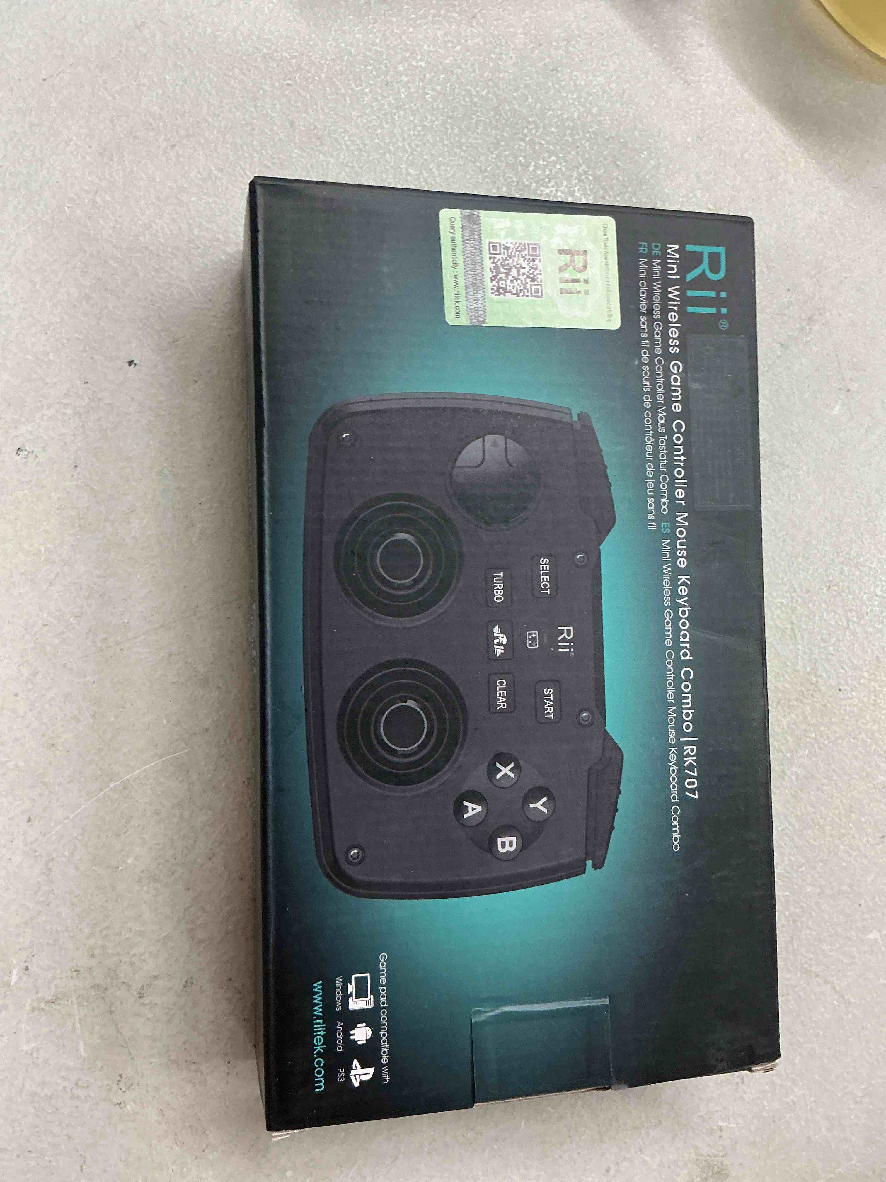 Condition photo showing New/Like New for (backlit version)rii rk707 3 in 1 multifunctional 2.4ghz wireless portable game controller 62-key rechargeable keyboard mouse combo turbo vibration function for pc/raspberry pi2/android tv google/tv b