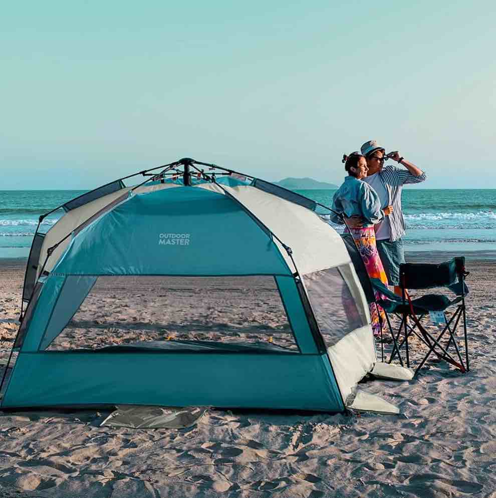 OutdoorMaster Pop Up Beach Tent for 4 Person - Easy Setup and Portable Beach Shade Sun Shelter Canopy with UPF 50+ UV Protection Removable Skylight Family Size - Light Blue+Gray