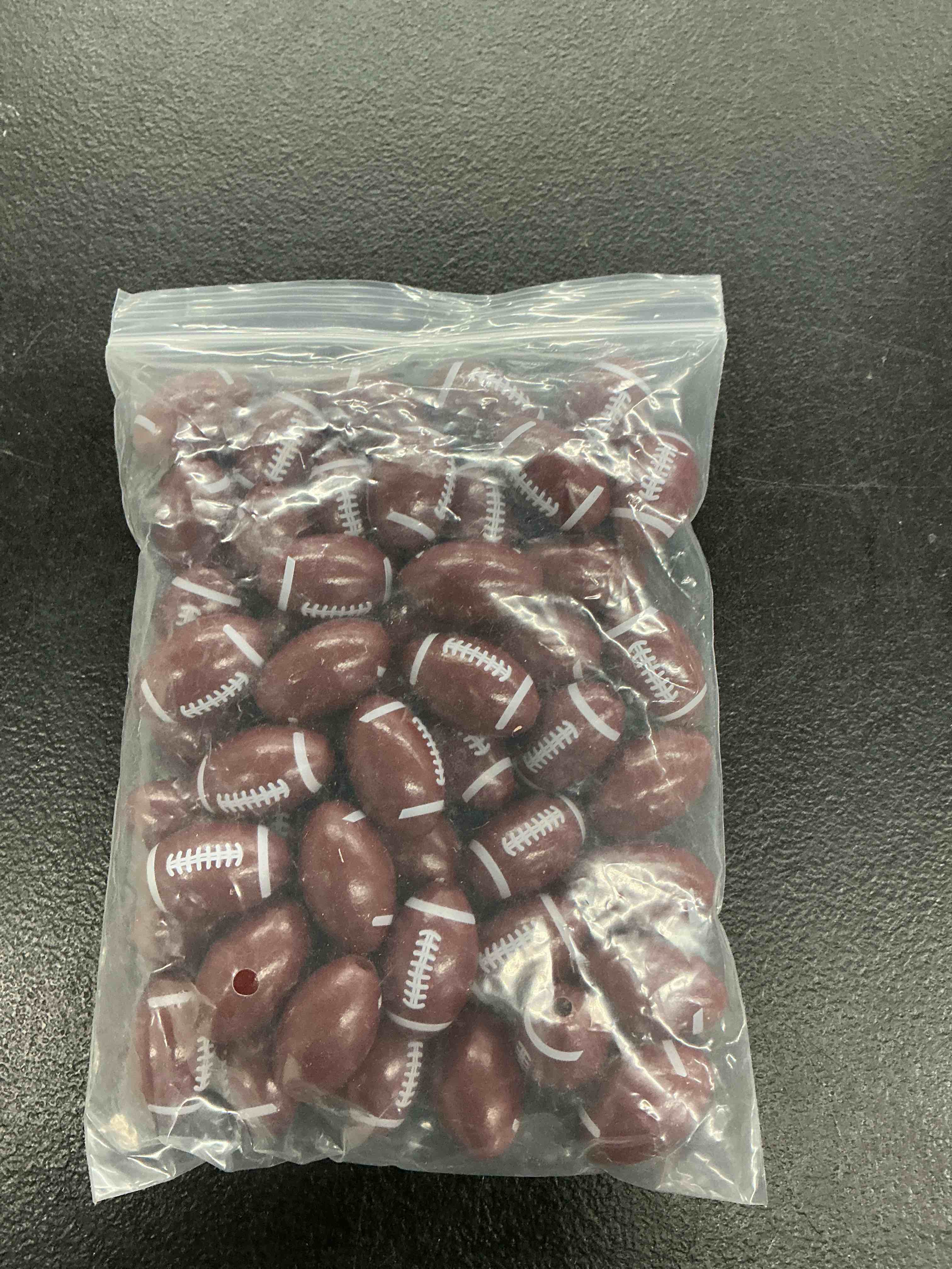 Condition photo showing Good Condition for 50 pcs football beads for bracelets, 28mm rugby wooden charms 3.3mm hole, jewelry making finding, rustic wood sport spacer buttons for handmade diy crafts, keychain, loose bangle, and home decoration
