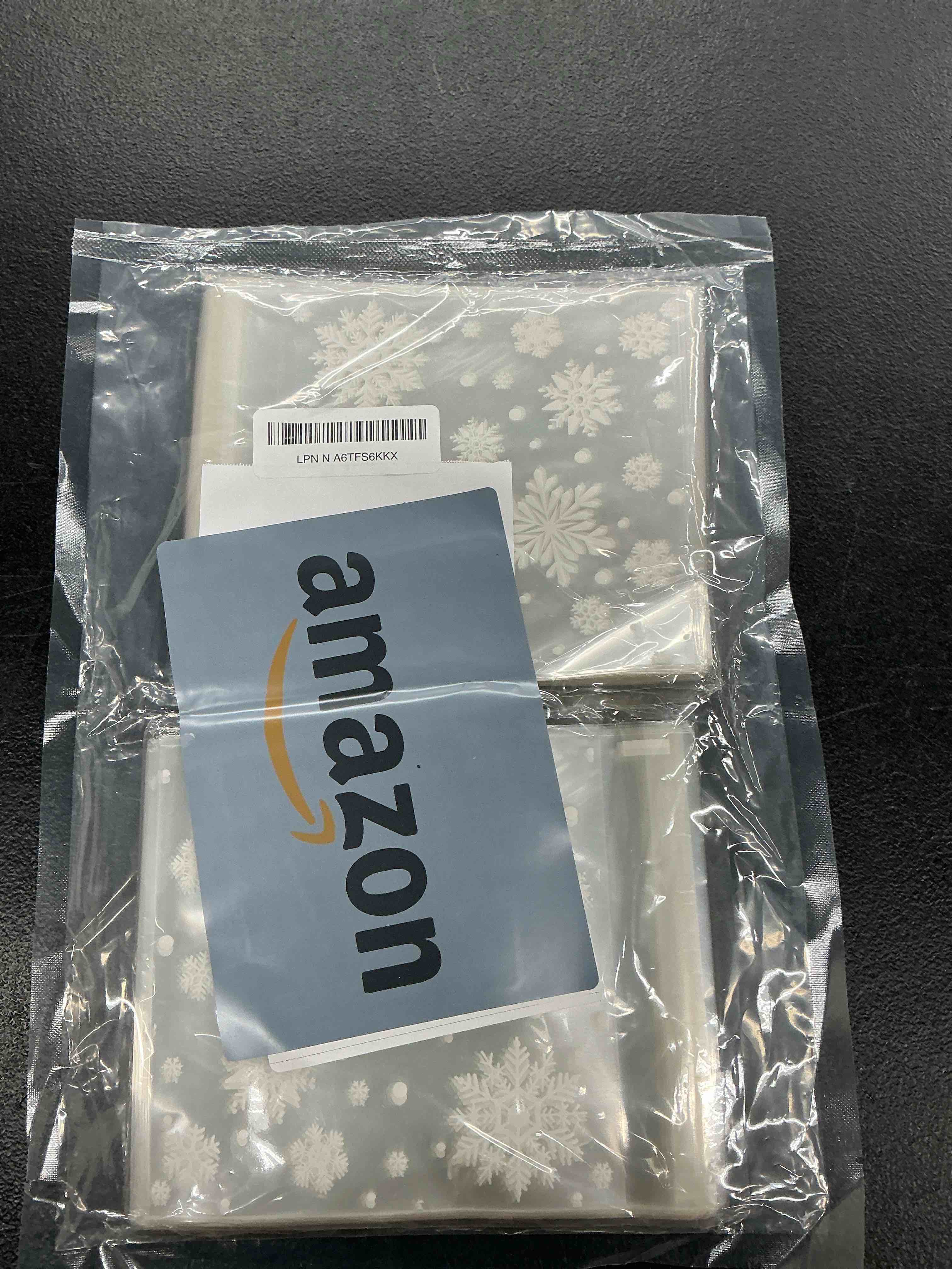 Condition photo showing Good Condition for cudicy christmas cookie bags 200pcs snowflake cellophane treat bags 5.5x5.5 self adhesive cookie bag for gift giving packaging candy goodie holiday homemade bakery 1 sheet (pack of 200)
