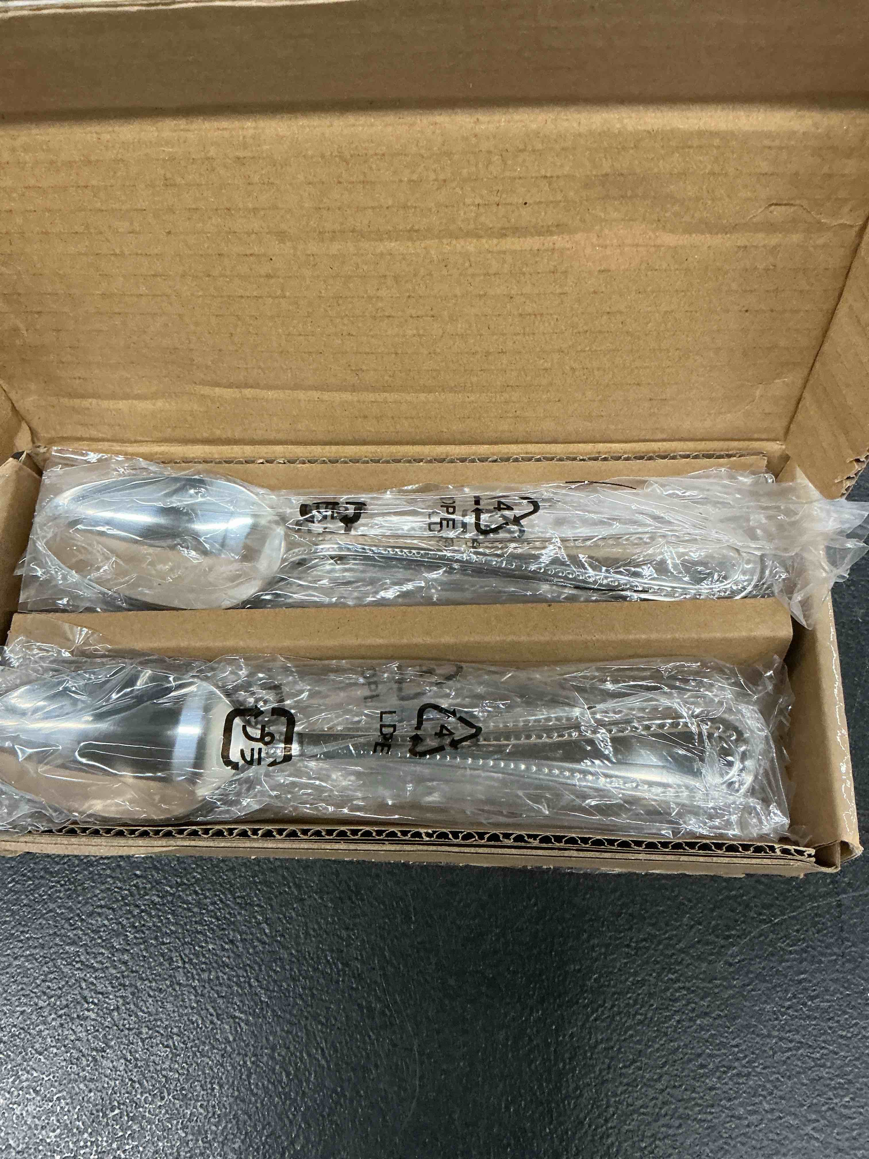Condition photo showing New/Like New for amazon basics stainless steel dishwasher safe dinner spoons with pearled edge, large tablespoons, 7.7 inches, pack of 12, silver dinner spoons 7.7 inches