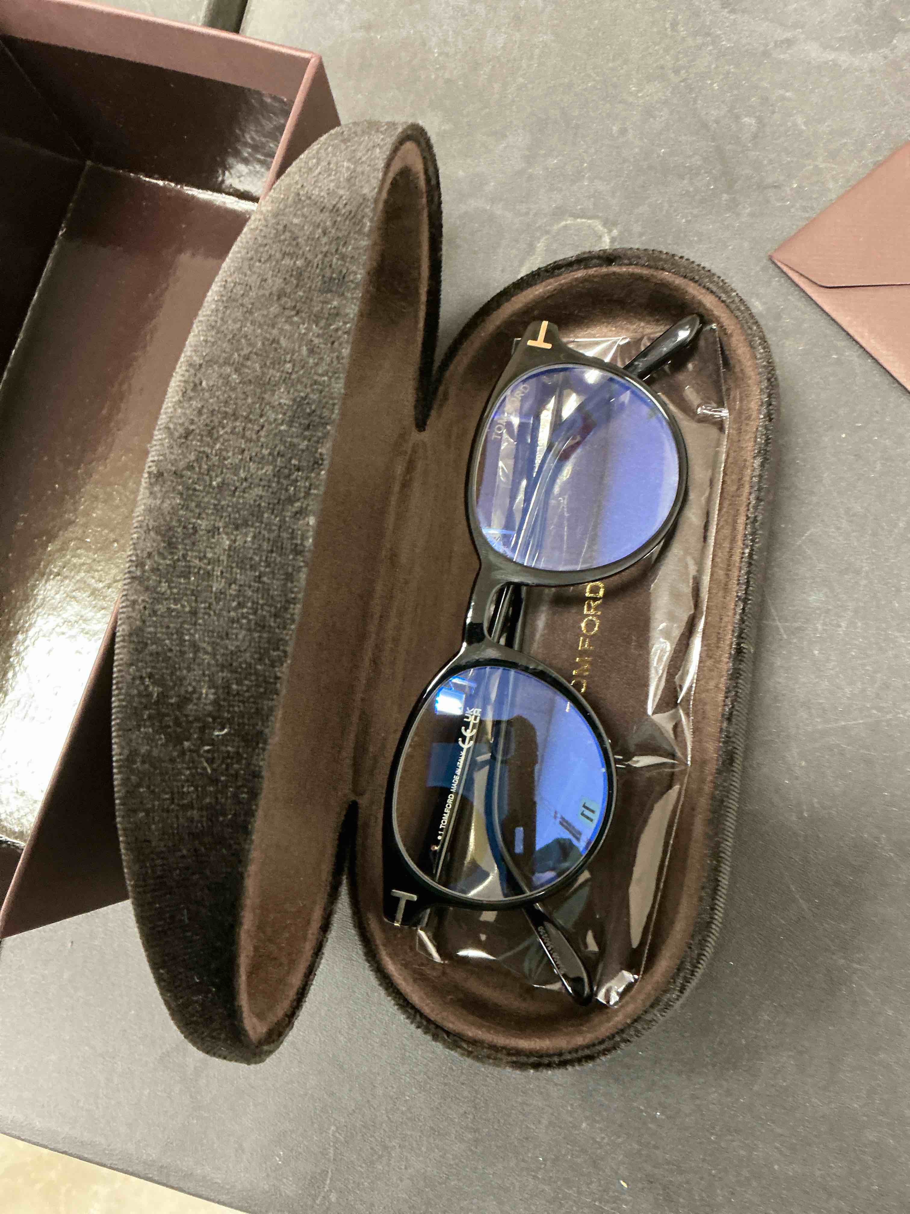 Condition photo showing New/Like New for Tom Ford Eyeglasses FT 5695 -B 001 Shiny Black/Blue Block Lenses
