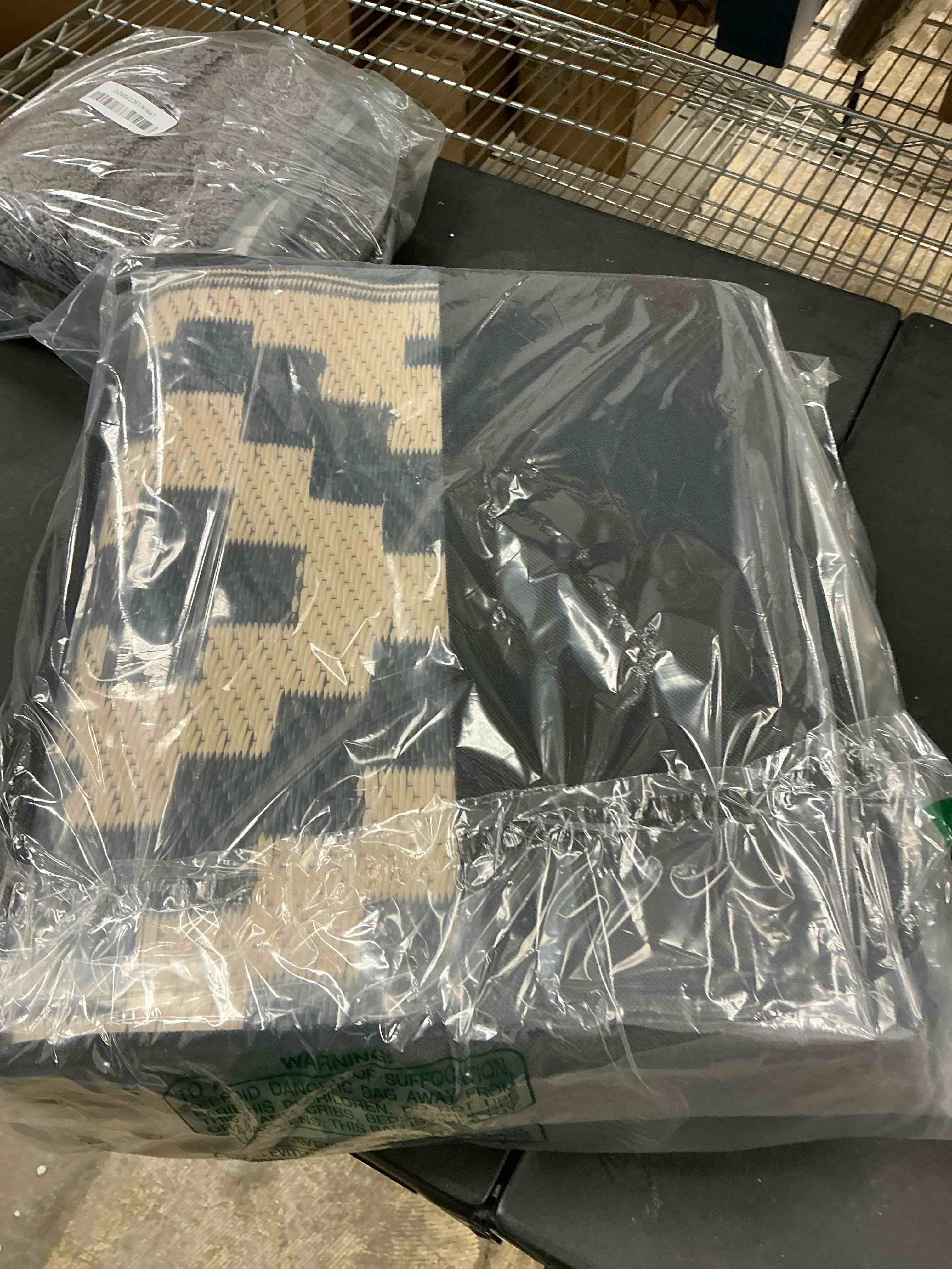 Condition photo showing New/Like New for SAND MINE Waterproof Outdoor Rug 5x8 ft, Plastic Reversible Rug, Modern Area Rug, Large Floor Mat for Outdoors, RV, Patio, Backyard, Deck, Picnic, Beach, Camping, Black & Beige Black & Beige 5 x 8 Feet