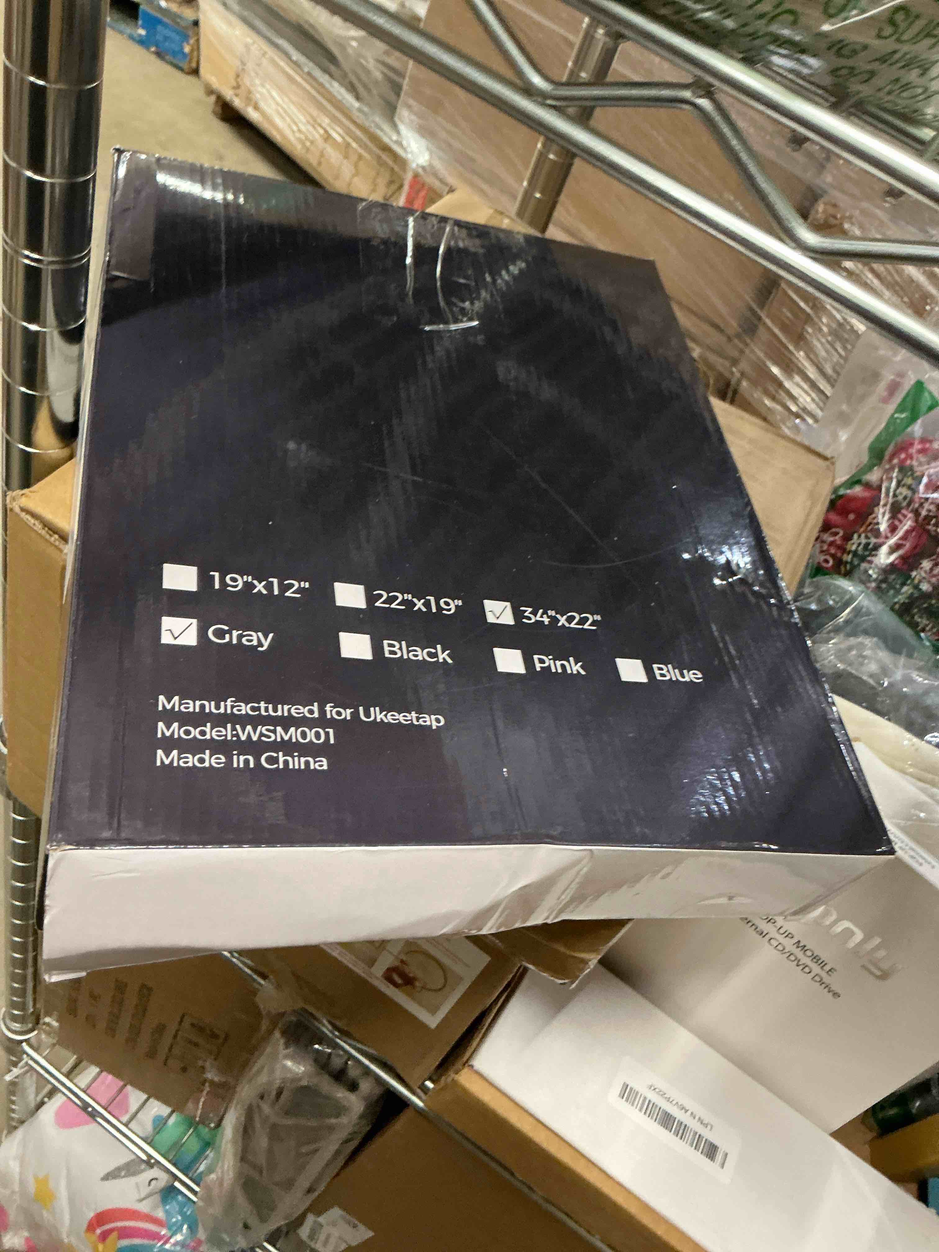Condition photo showing Good Condition for 34" x 22" Extra Thick Waterproof Silicone Mat with Raised Edge, Under Sink Mat for Kitchen & Bathroom, Kitchen Cabinet Liner, Multi-Purpose for Storage & Protection, Gray Gray 34" x 22"