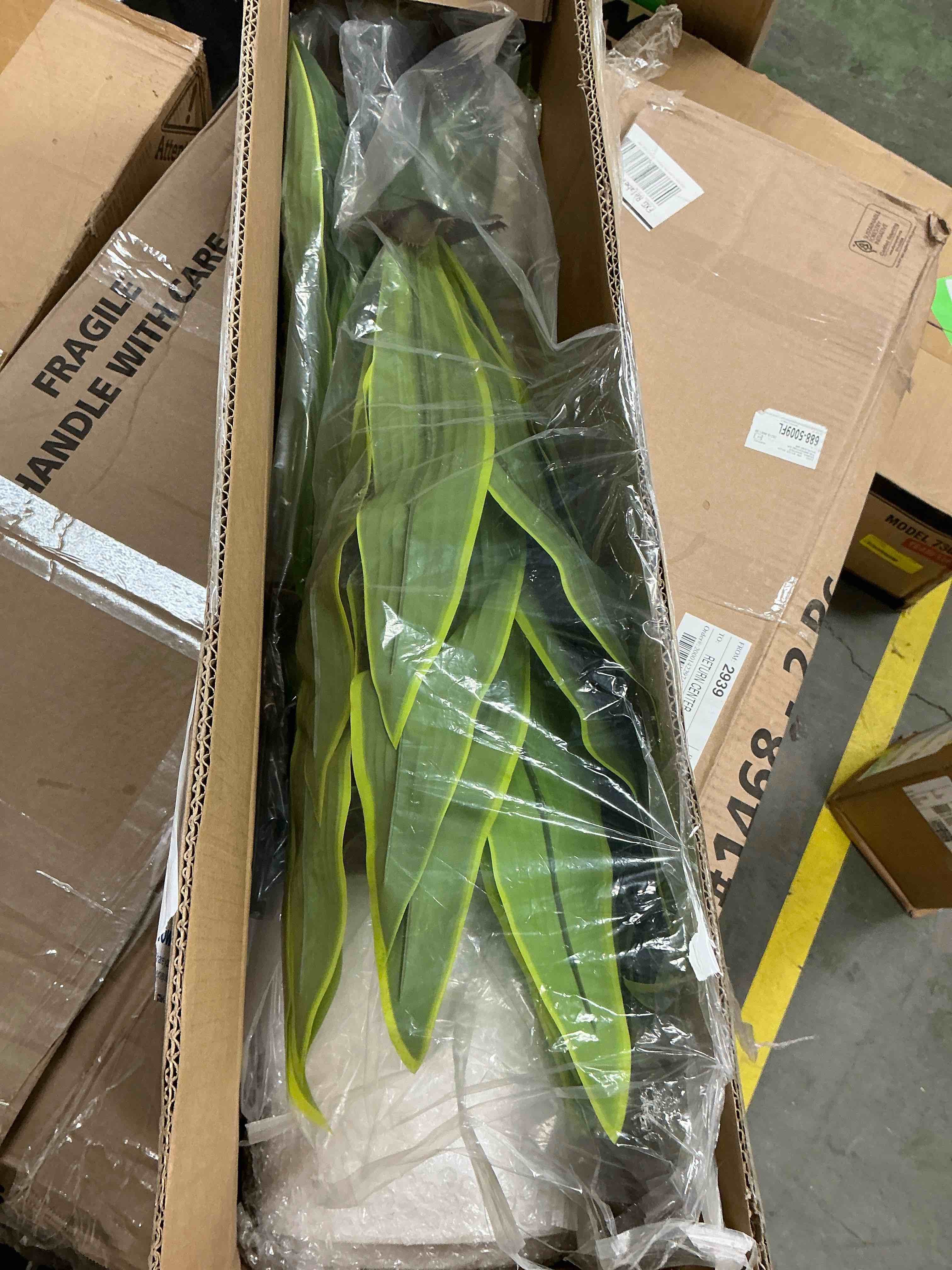 Condition photo showing Good Condition for DR.Planzen 4FT  Artificial Dracaena Tree with White Planter, Tall Faux Dracaena Tree, Artificial Plants for Home Office Decor