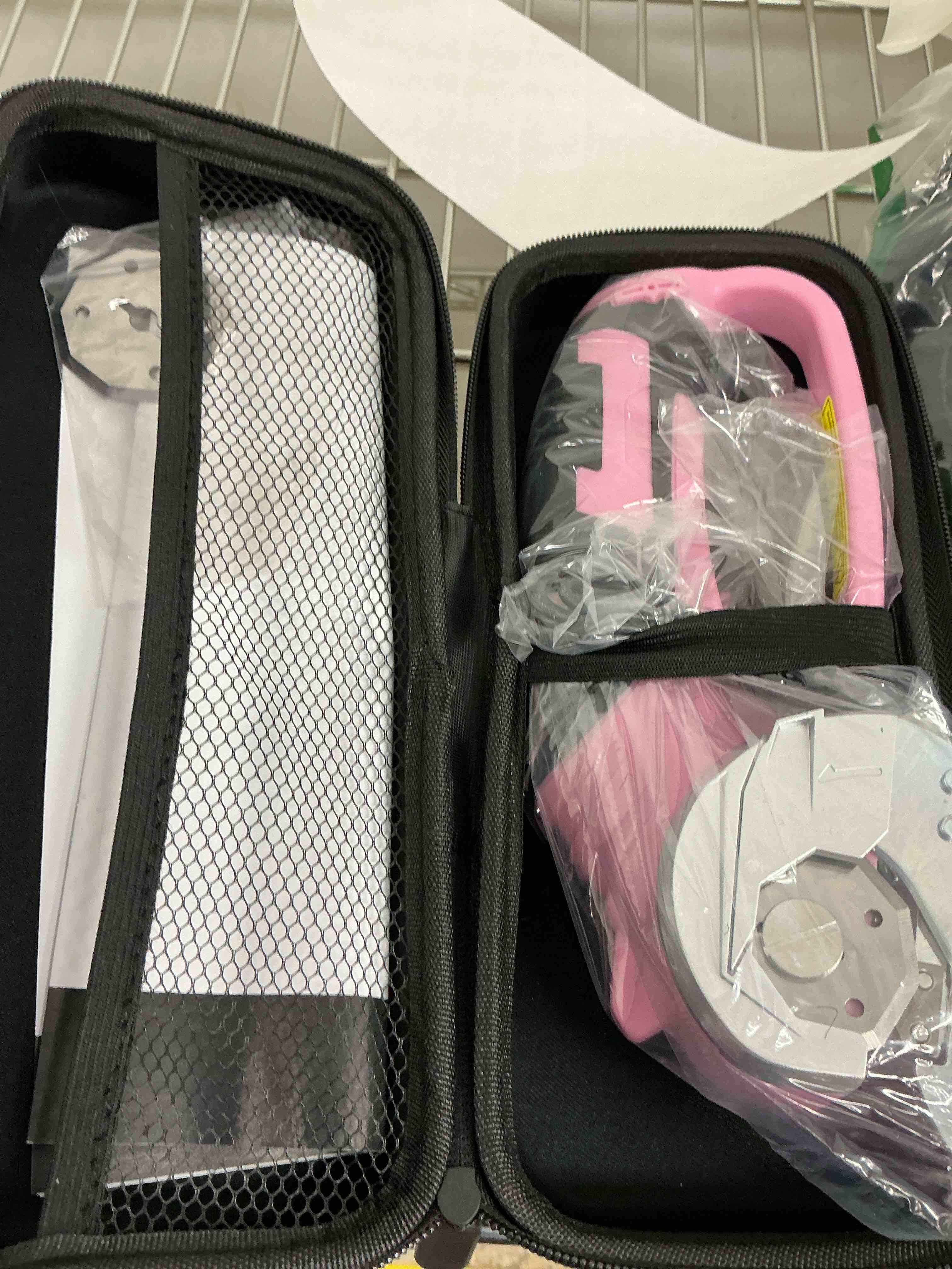 Condition photo showing New/Like New for Cordless Electric Scissors, 4V Rechargeable Box Cutter & Cardboard Cutter with LED Light, Safety Lock - Rotary Cutter for Fabric, Leather, Carpet, Plastic, Crafting, Sewing with Storage Box (Pink) Pink-storage Bag + Blade