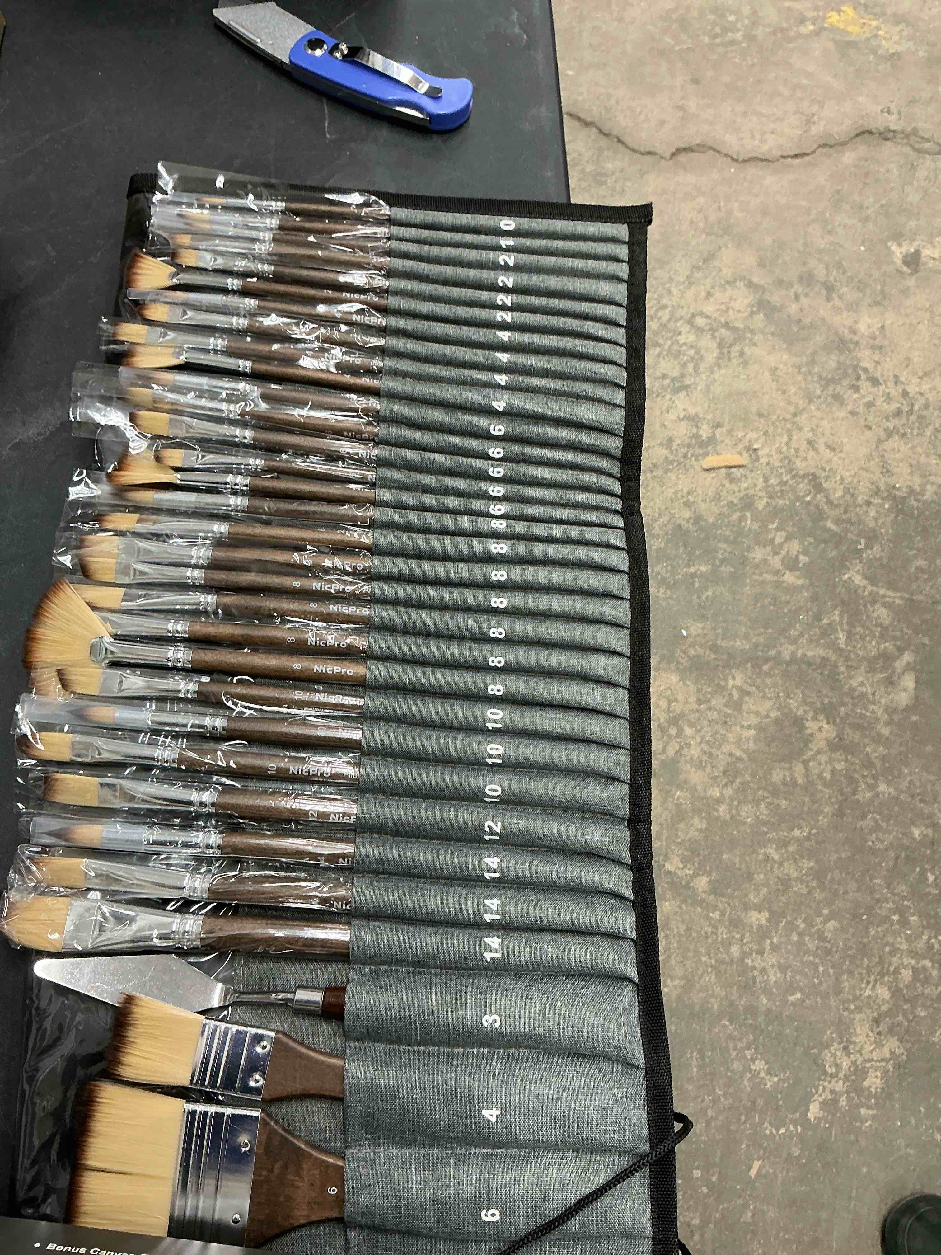 Condition photo showing New/Like New for Nicpro 32pcs Paint Brush Set, Professional Paintbrushes with Paint Spatula and Cloth Roll Case, Craft Paint Brushes for Acrylic Painting, Oil, Watercolor, Gouache, Art Supplies for Artists Beginners