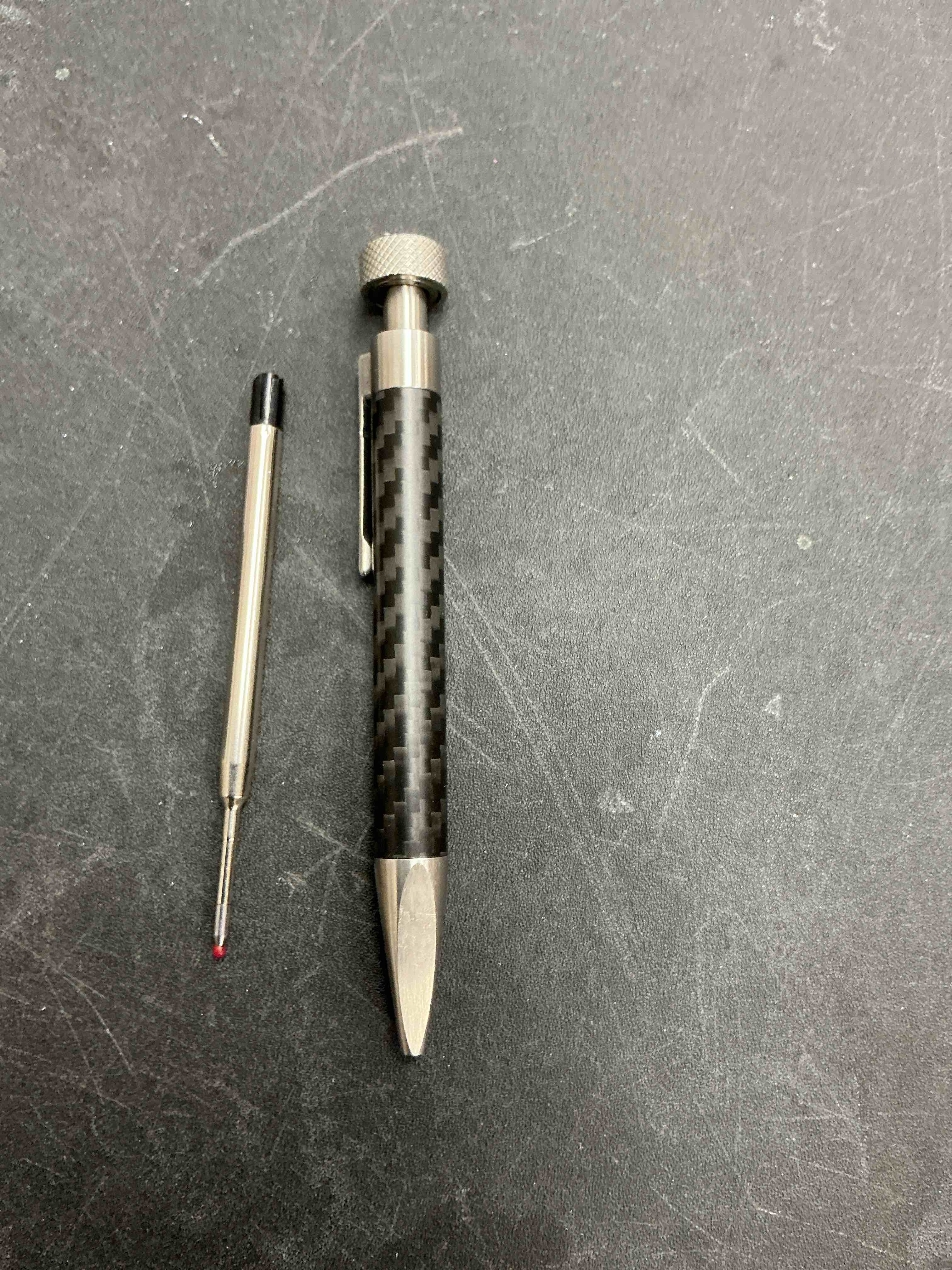 Condition photo showing Good Condition for Cool Hand 5" Retractable Office Business Writing Pen with Fidget Spinner, EDC Ballpoint Pen, Carbon Fiber Barrel, Ballpoint Ink Refillable, CNC Machined Clip