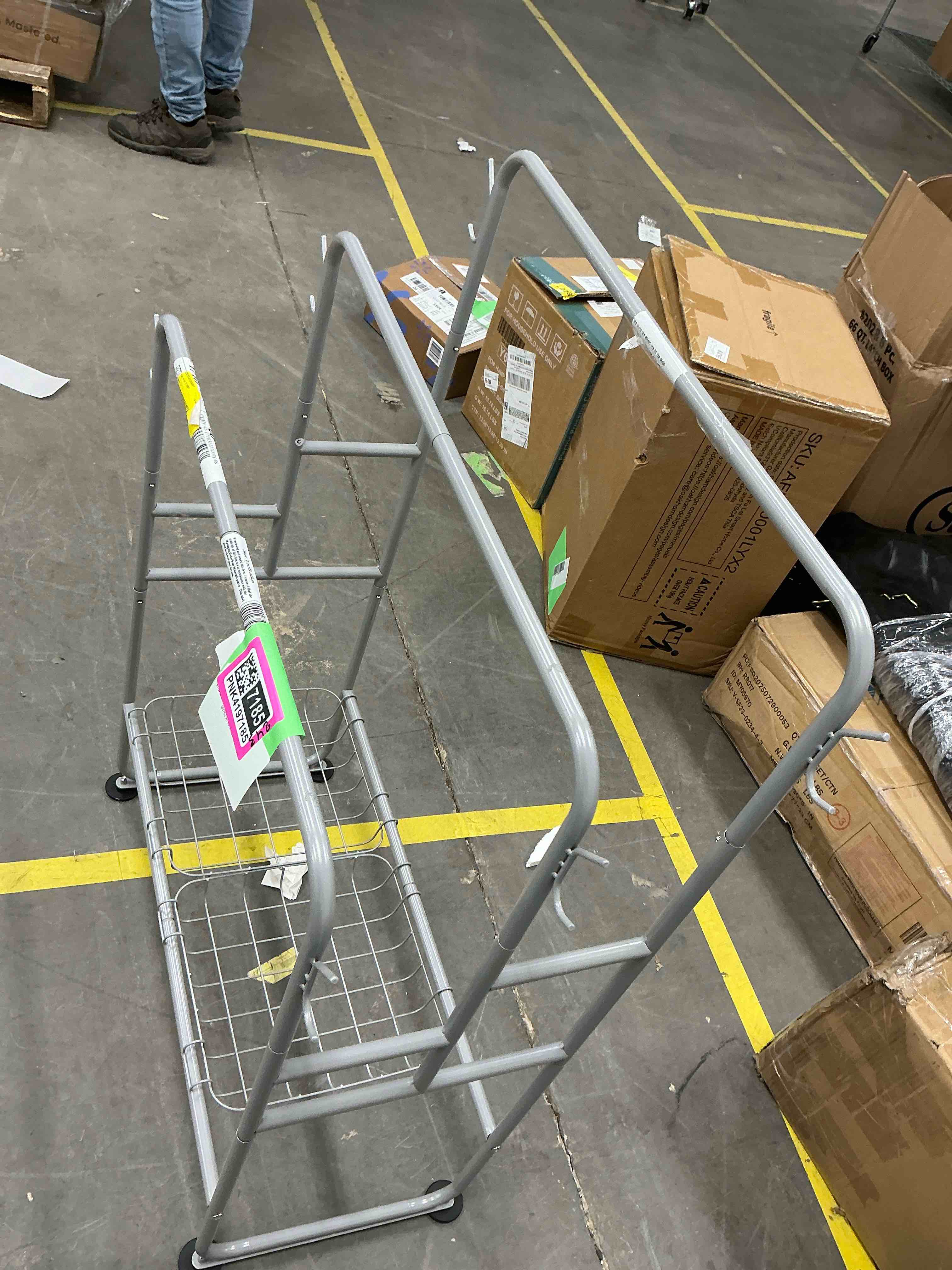 Condition photo showing Good Condition for KAYFIA 40" H Free Standing Towel Rack with 2 Storage Baskets & 6 Hooks, 3 Tier Silver Metal Towel Stand for Extra Large Towel, Modern Industrial Blanket Ladder Display and Drying Rack for Bathroom
