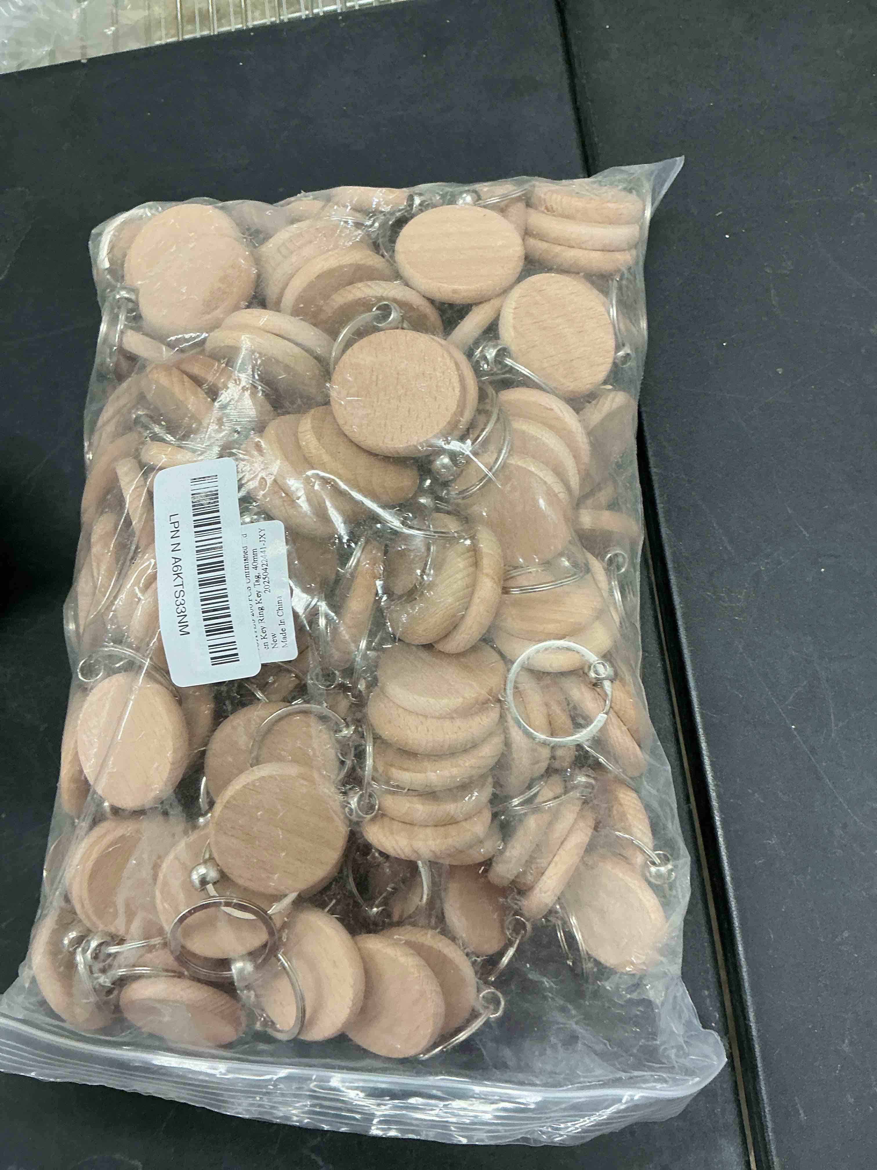 Condition photo showing New/Like New for JUXYES 200 PCS Unfinished Wooden Keychain Blanks for Engraving, Wood Engraving Blanks Key Chain, DIY Round Wood Keychain Tags Unfinished Wooden Key Ring Key Tag, 40mm