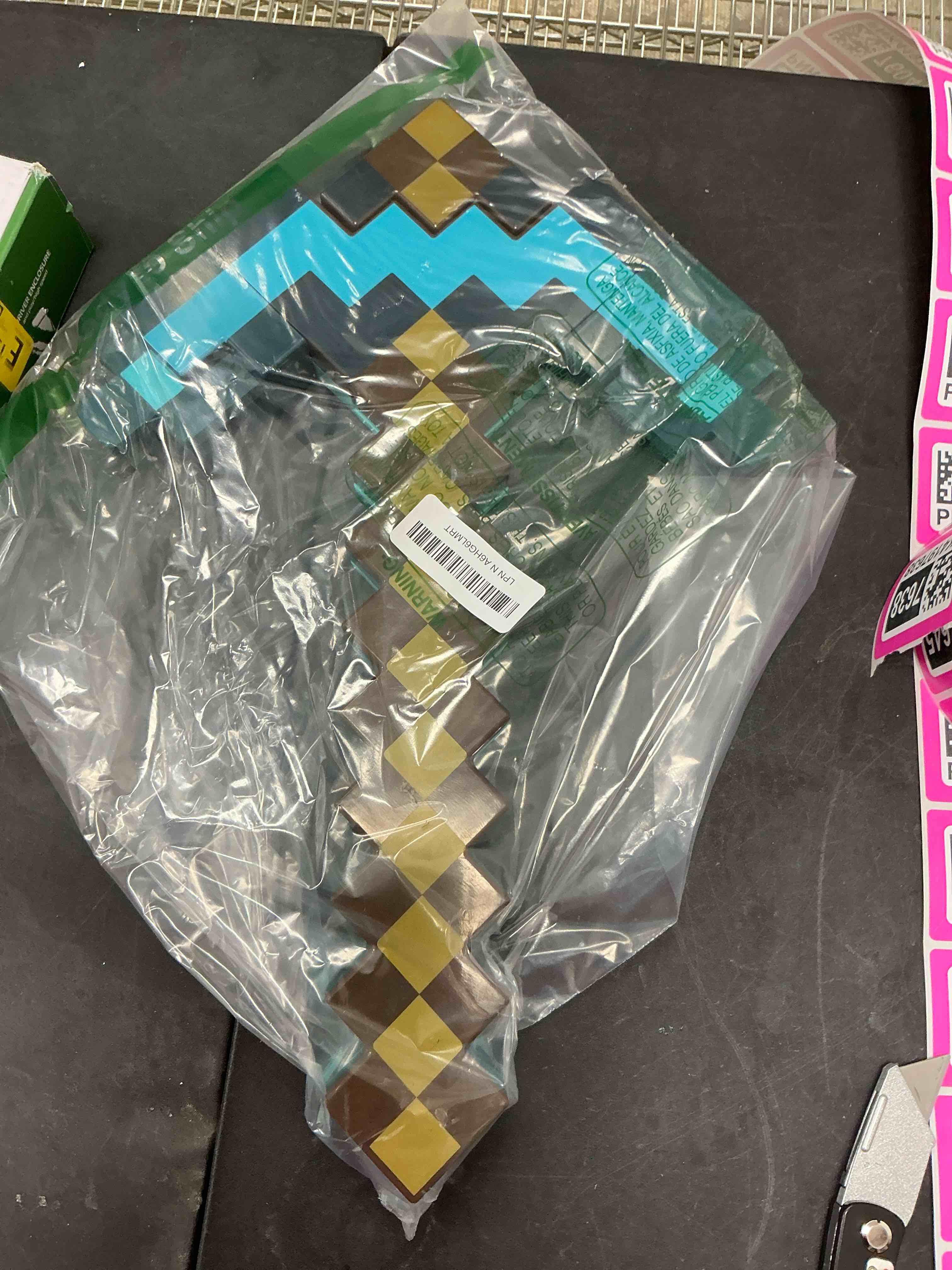Condition photo showing Good Condition for Mattel Minecraft Transforming Diamond Sword & Pick-Axe Kid-Sized 2-in-1 Toy Accessory for Role-Play & Costumes