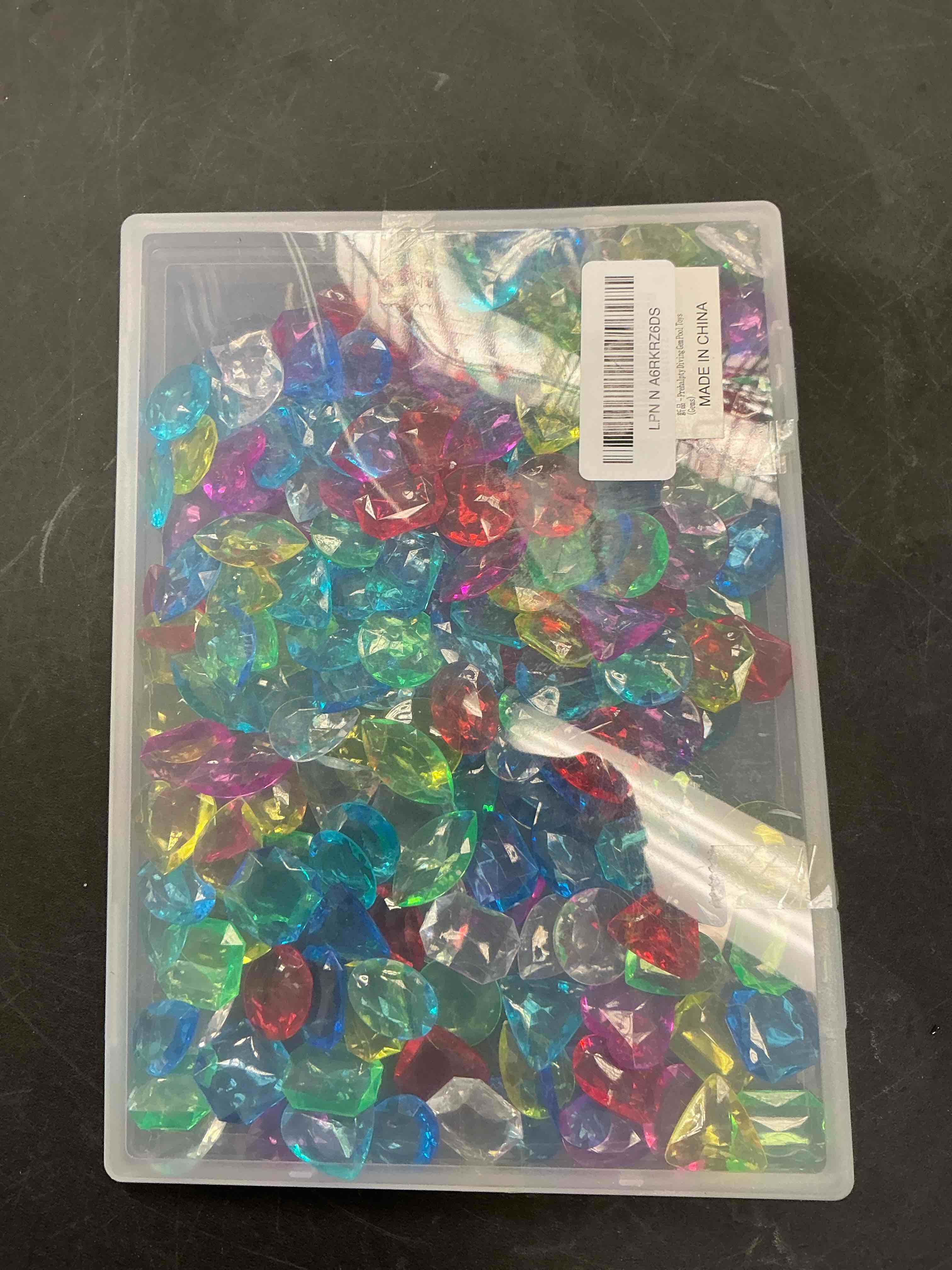 Condition photo showing Good Condition for 200 Pcs Gemstones for Kids, 7 Styles 1" Plastic Gems Treasure Hunt Toys,Pirate Treasure Mermaid Swim Toys,Fake Gems for Vase Fillers Gems 200PCS