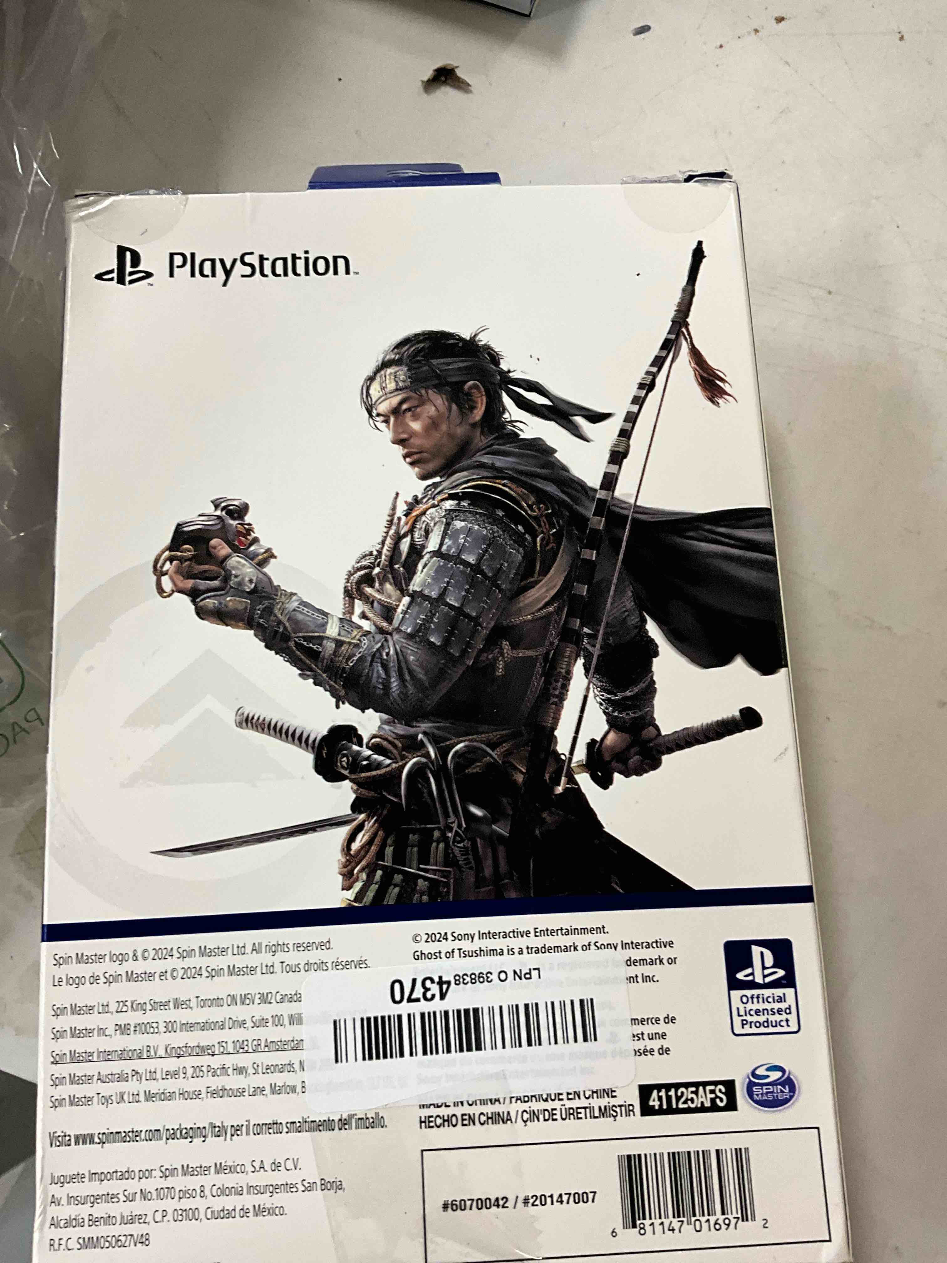 Condition photo showing Good Condition for PlayStation, Ghost of Tsushima, 6” Jin Sakai Samurai Action Figure & 2 Accessories, The Shapes Collection, for PS5 Fans & Collectors Ages 17+