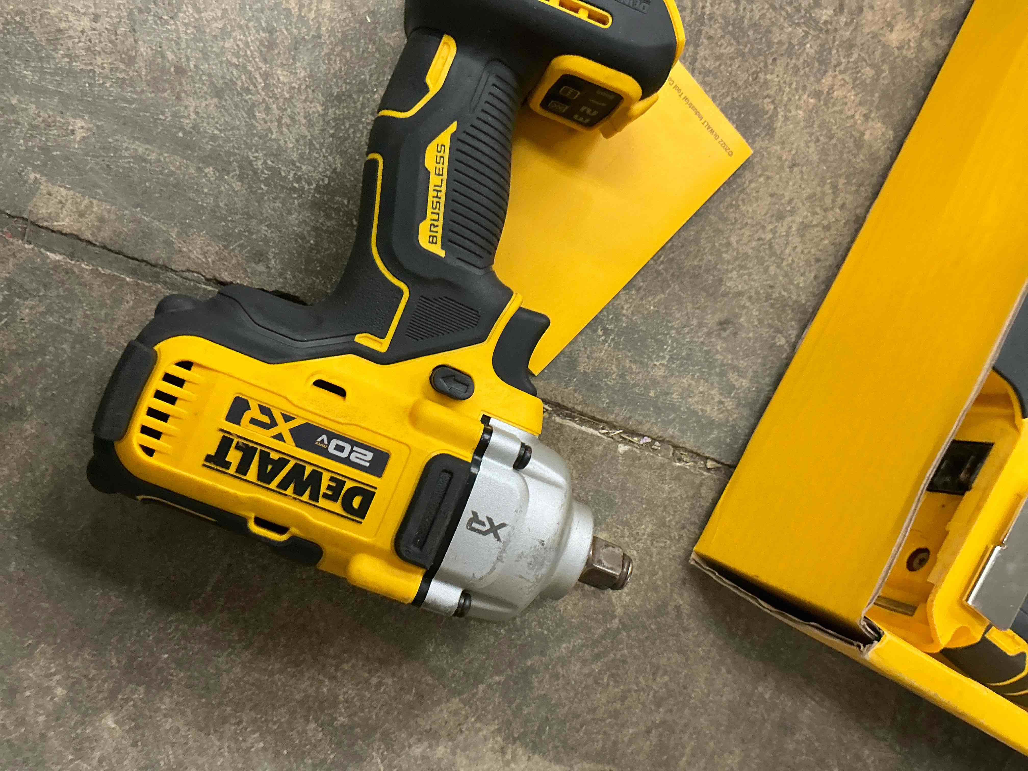 Condition photo showing Good Condition for dewalt 20v max cordless impact wrench, 1/2' hog ring, includes led work light and belt clip, bare tool only (dcf891b)