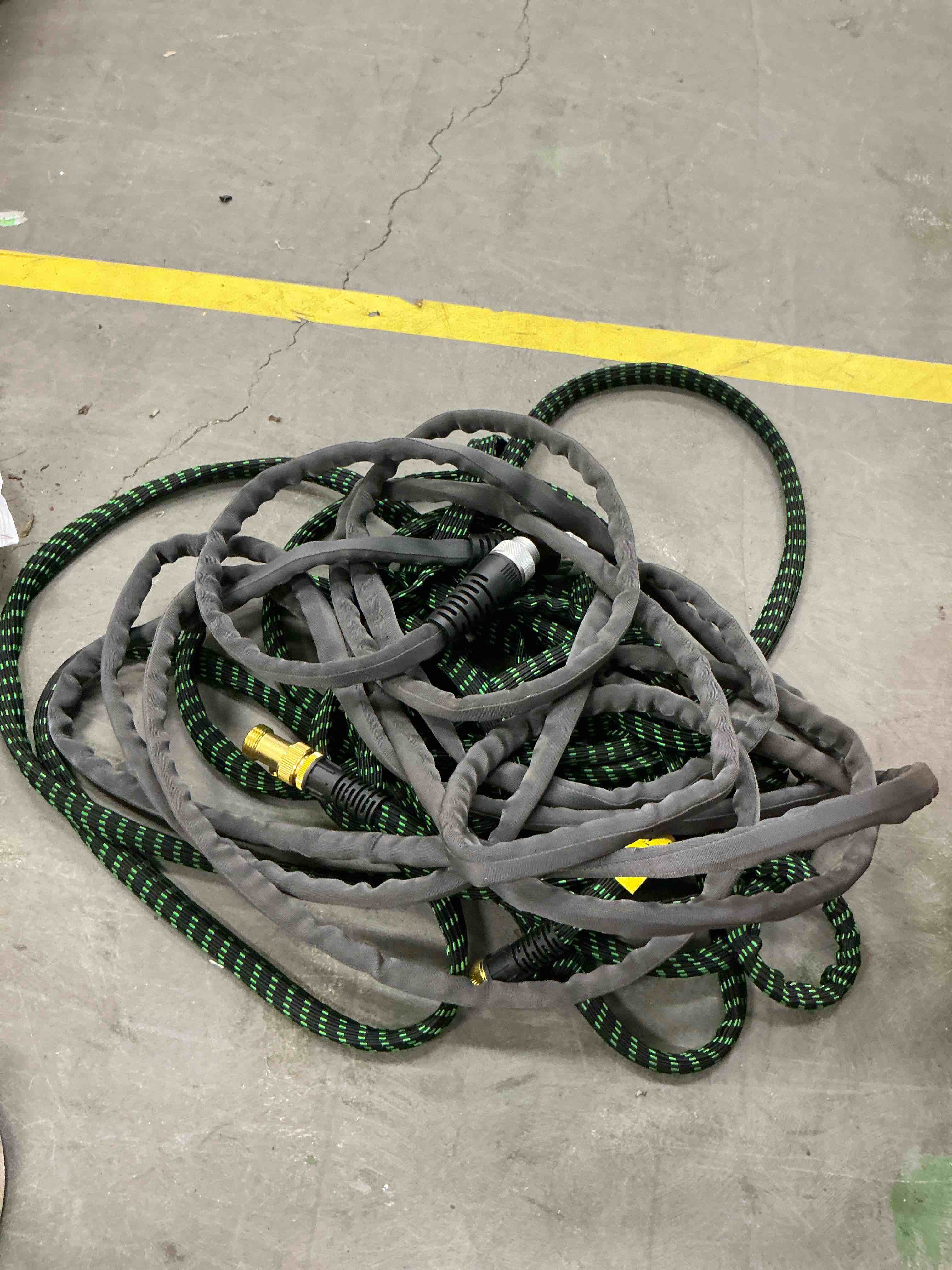 Condition photo showing As Is for 2 untested hoses including zero-g teknor apex 5/8-in x 25-ft premium -duty kink free woven gray hose
