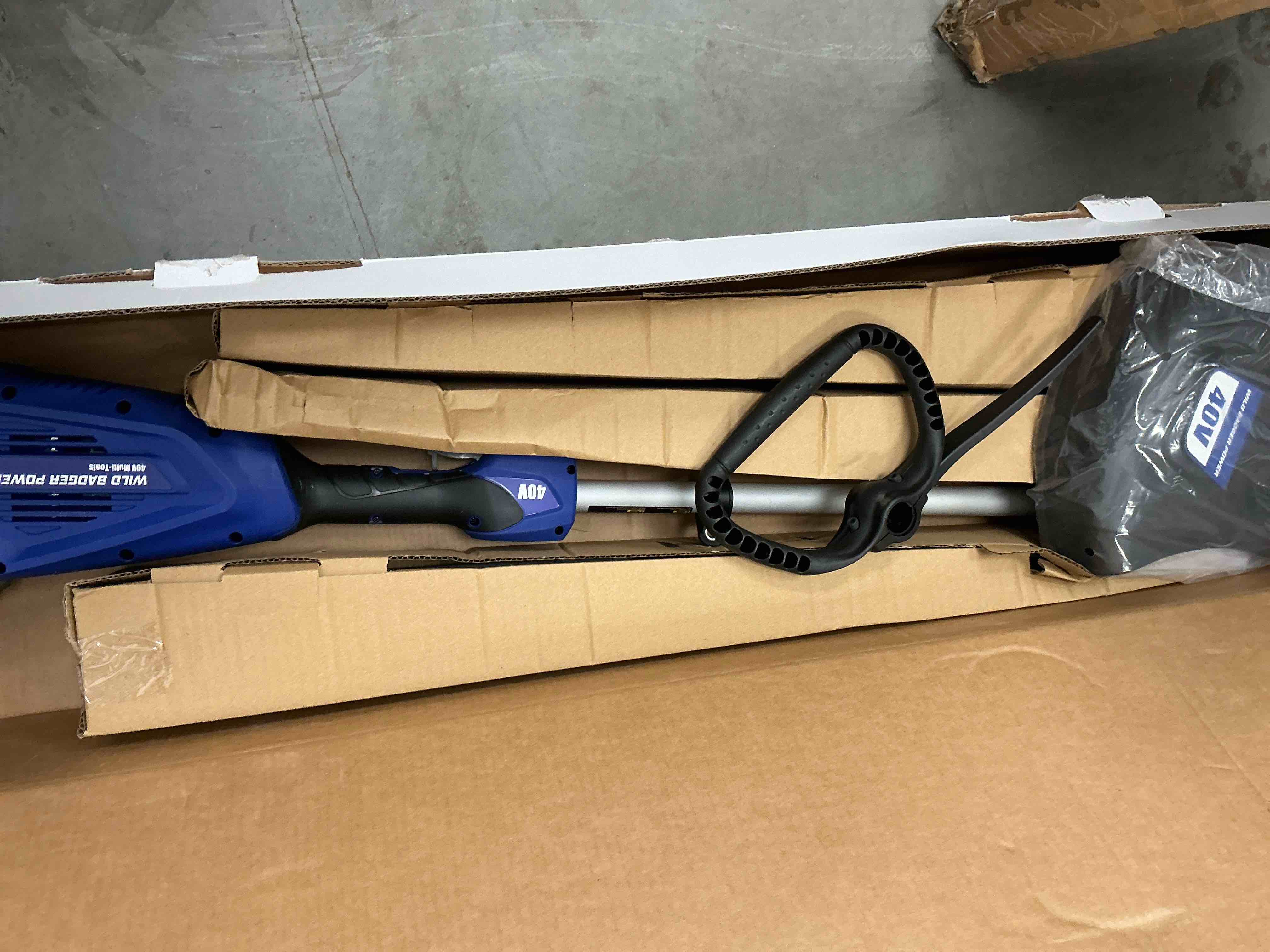Condition photo showing New/Like New for wild badger 40v 4-in-1 cordless outdoor power tool kit (weed wacker, pole saw, hedge trimmer, brush cutter) with 2*4 ahbatteries & charger